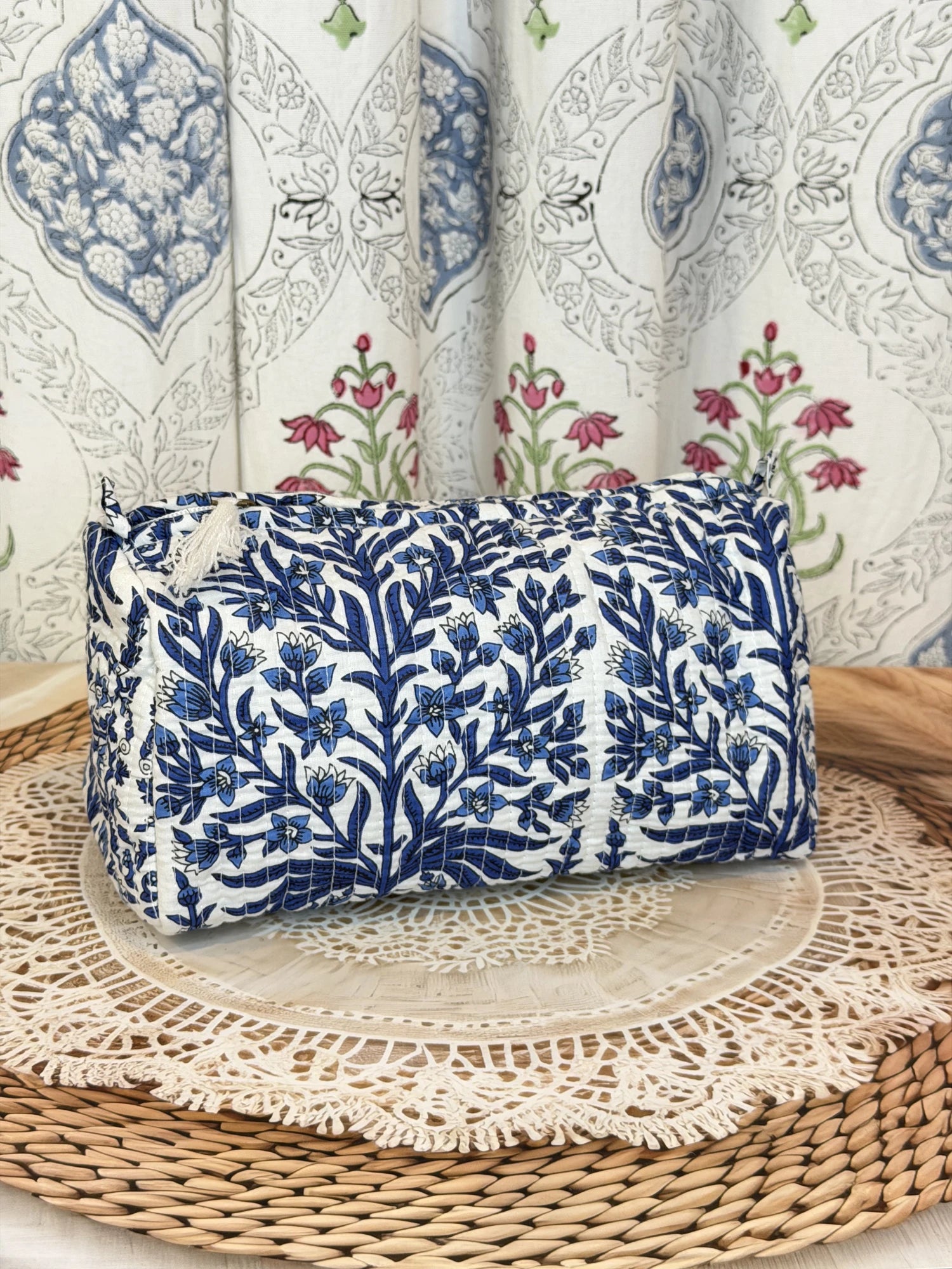 Jaipur block print cotton quilted large tote bag with matching pouch, blue floral and leaf print, 18x18x6 inch tote with 10x6 inch pouch for keeping cosmetics, medicines and toiletries organized side view