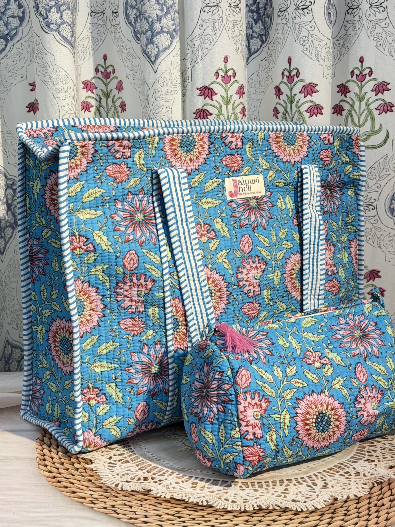 Jaipur block print cotton quilted large tote bag with matching pouch, blue floral print, 18x18x6 inch tote with 10x6 inch pouch for storing toiletries, cosmetics and daily travel essentials front view