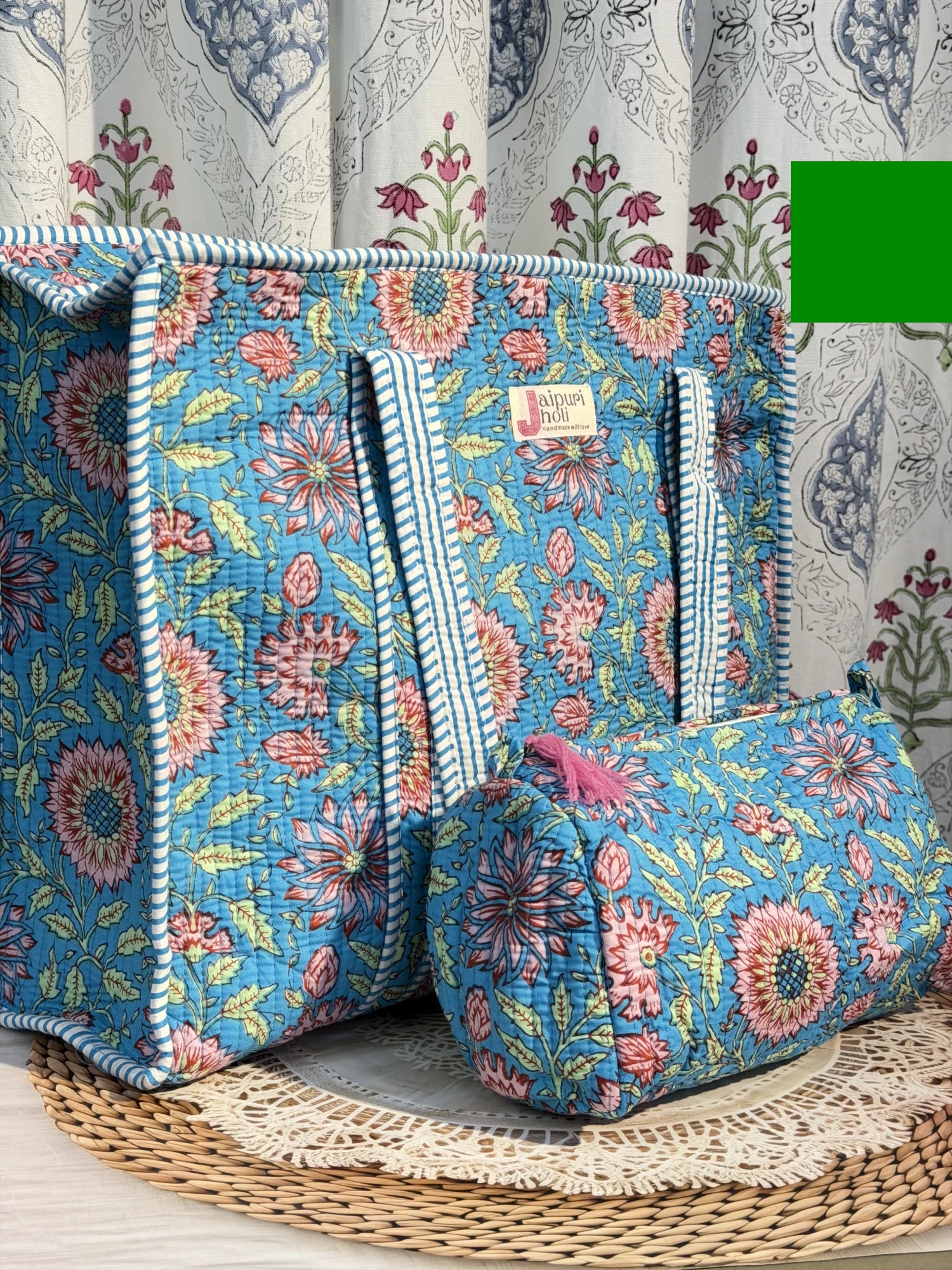 Jaipur block print cotton quilted large tote bag with matching pouch, blue floral print, 18x18x6 inch tote with 10x6 inch pouch for storing toiletries, cosmetics and daily travel essentials side view