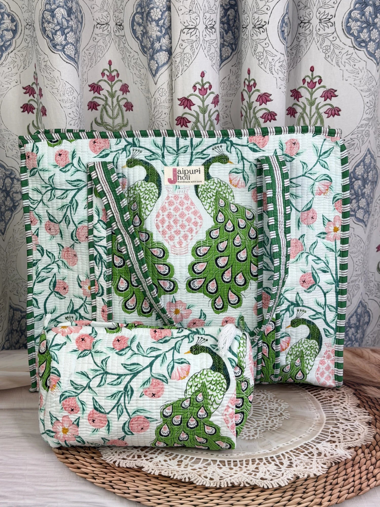 Jaipur block print cotton quilted large tote bag with matching pouch, green and pink peacock print, 18x18x6 inch tote with 10x6 inch pouch for organizing toiletries and other travel essentials front view