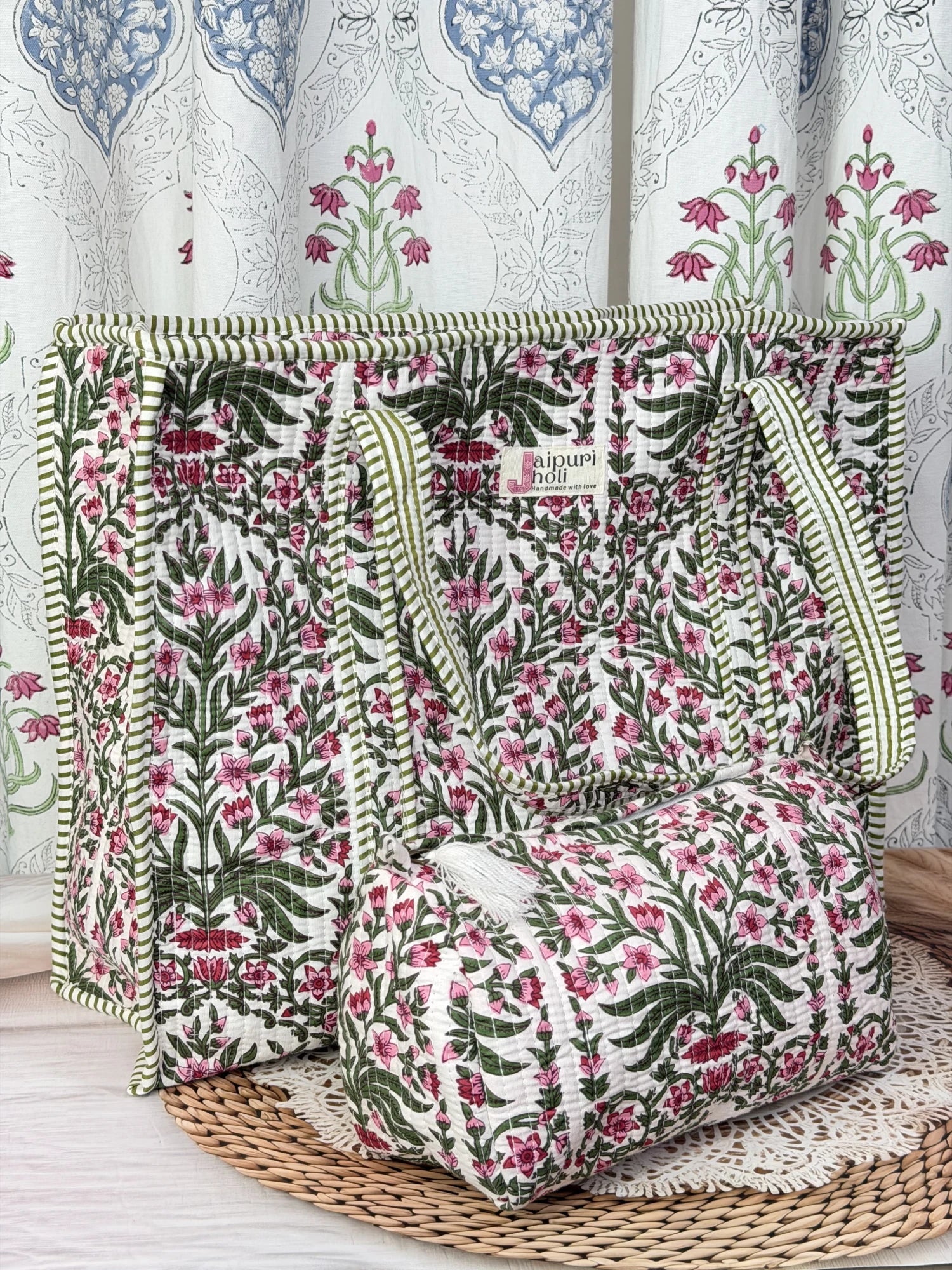 Jaipur block print cotton quilted large tote bag with matching pouch, pink floral and green leaf print, 18x18x6 inch tote with 10x6 inch pouch for storing toiletries and everyday travel items front view