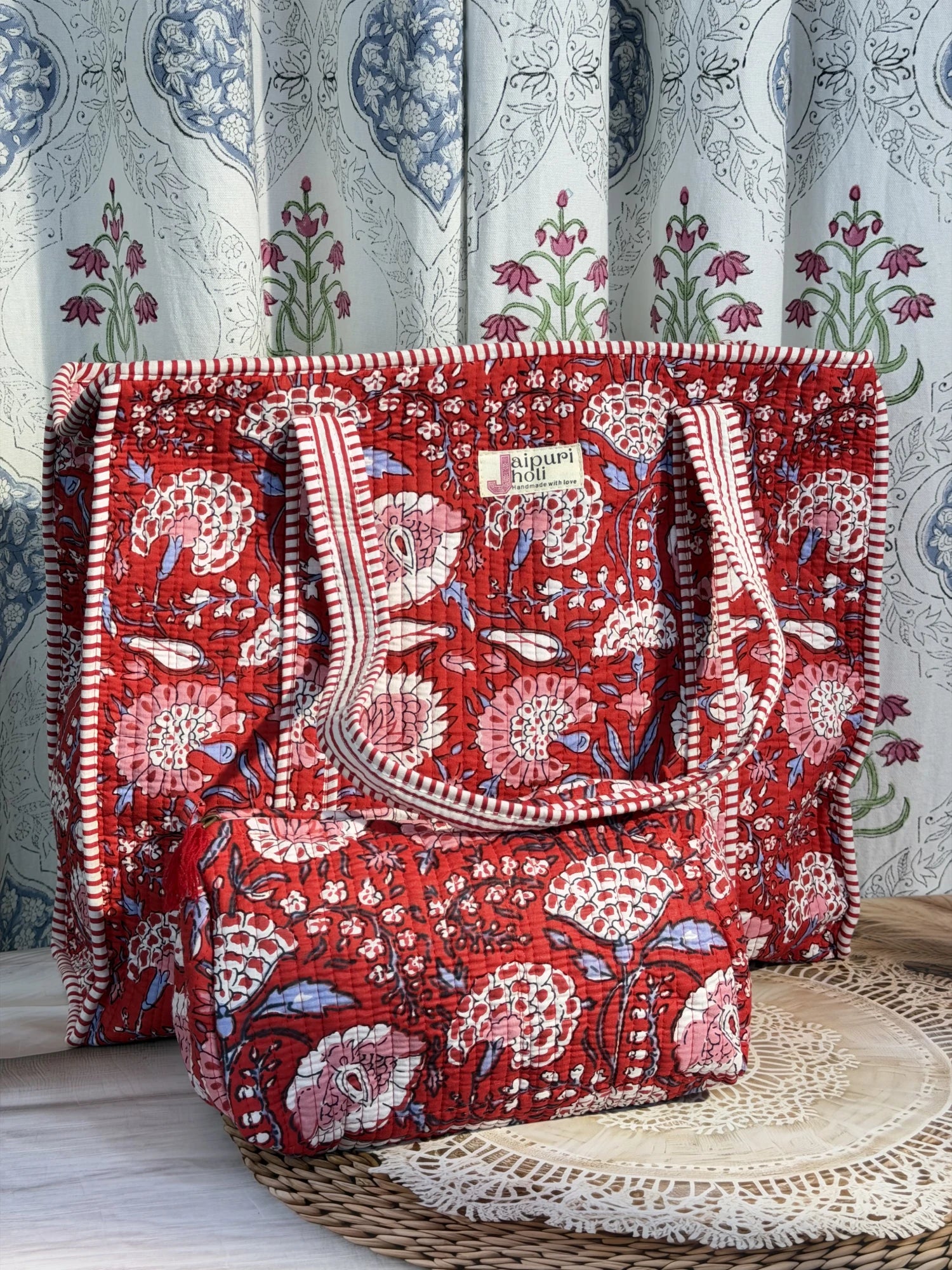 Jaipur block print cotton quilted large tote bag with matching pouch, red floral print, 18x18x6 inch tote with 10x6 inch pouch for organizing cosmetics, medicines and small essentials back 
view