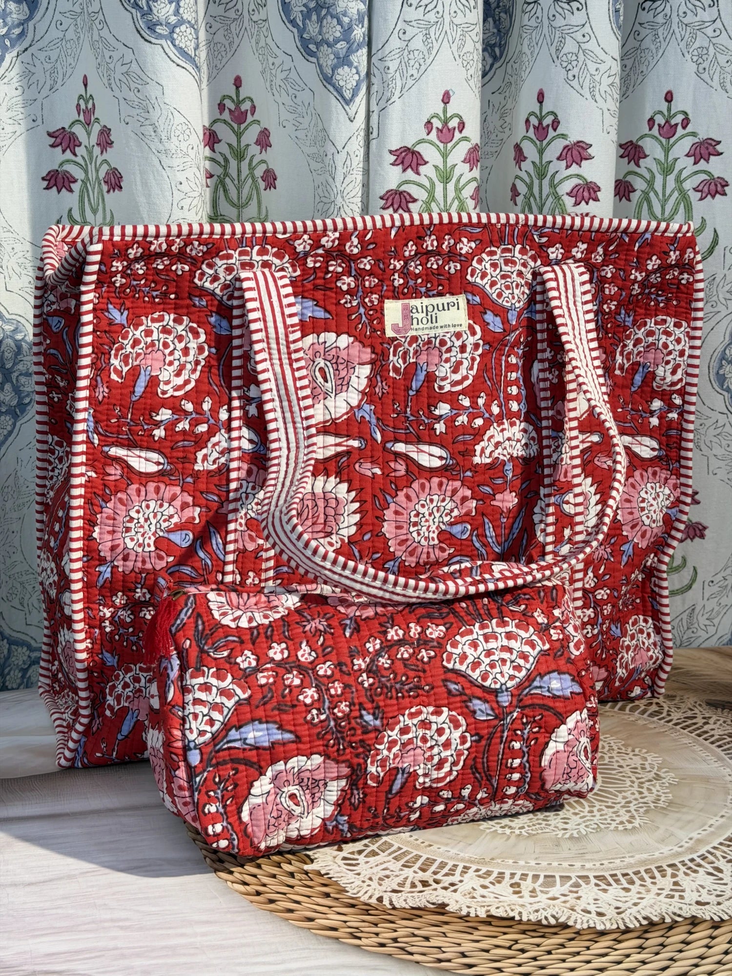 Jaipur block print cotton quilted large tote bag with matching pouch, red floral print, 18x18x6 inch tote with 10x6 inch pouch for organizing cosmetics, medicines and small essentials front view