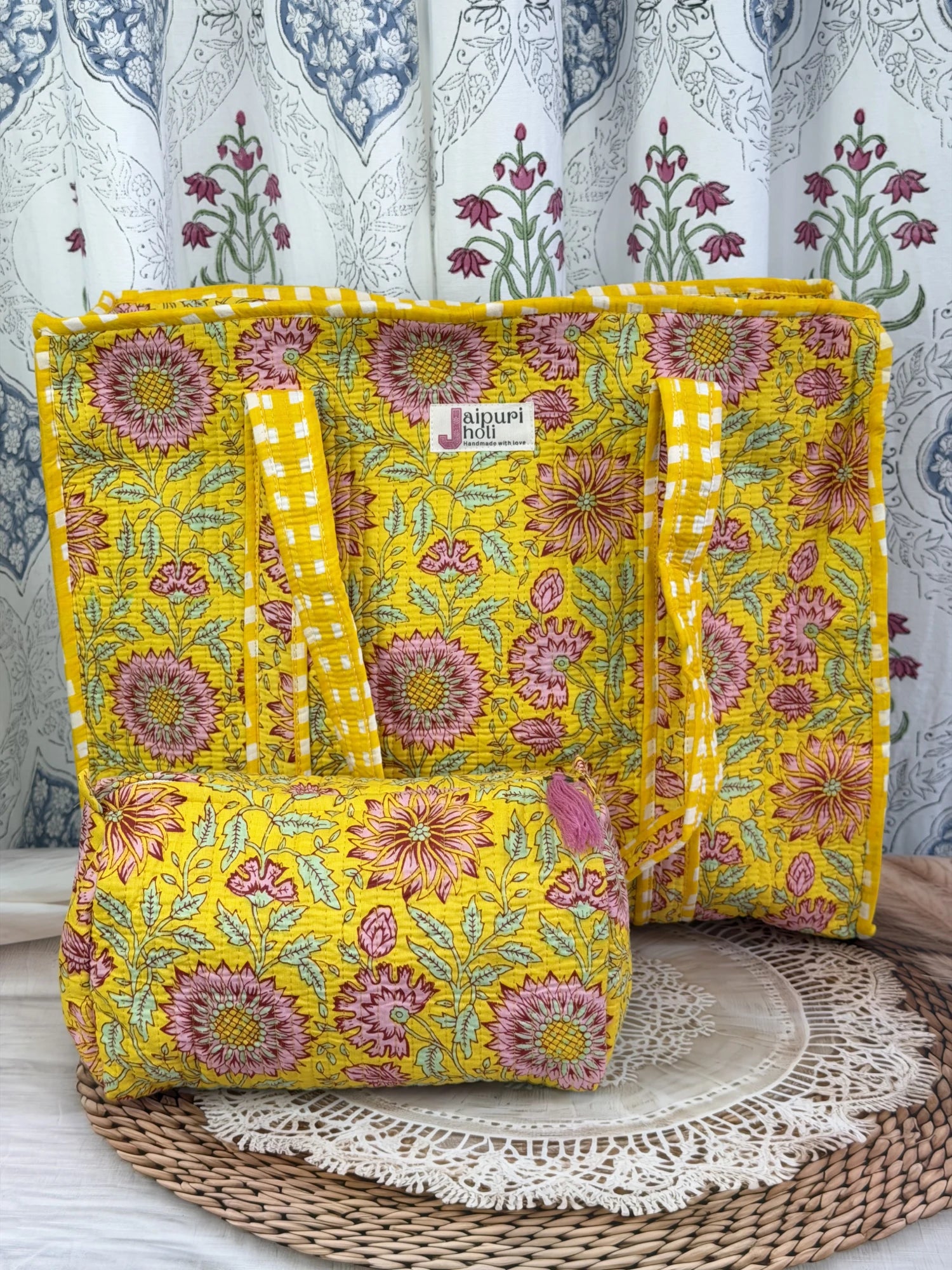 Jaipur block print cotton quilted large tote bag with matching pouch, yellow floral print, 18x18x6 inch tote with 10x6 inch pouch for keeping toiletries, cosmetics and travel necessities organized front view