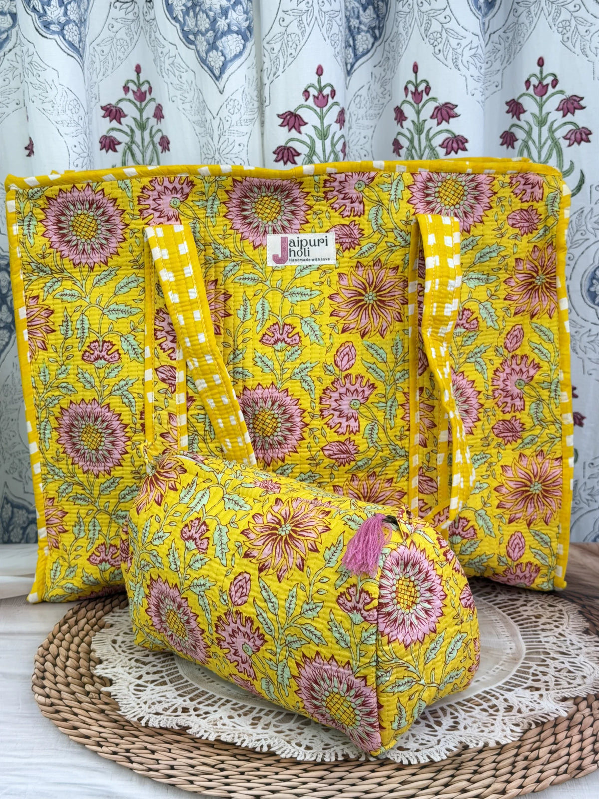Jaipur block print cotton quilted large tote bag with matching pouch, yellow floral print, 18x18x6 inch tote with 10x6 inch pouch for keeping toiletries, cosmetics and travel necessities organized side view
