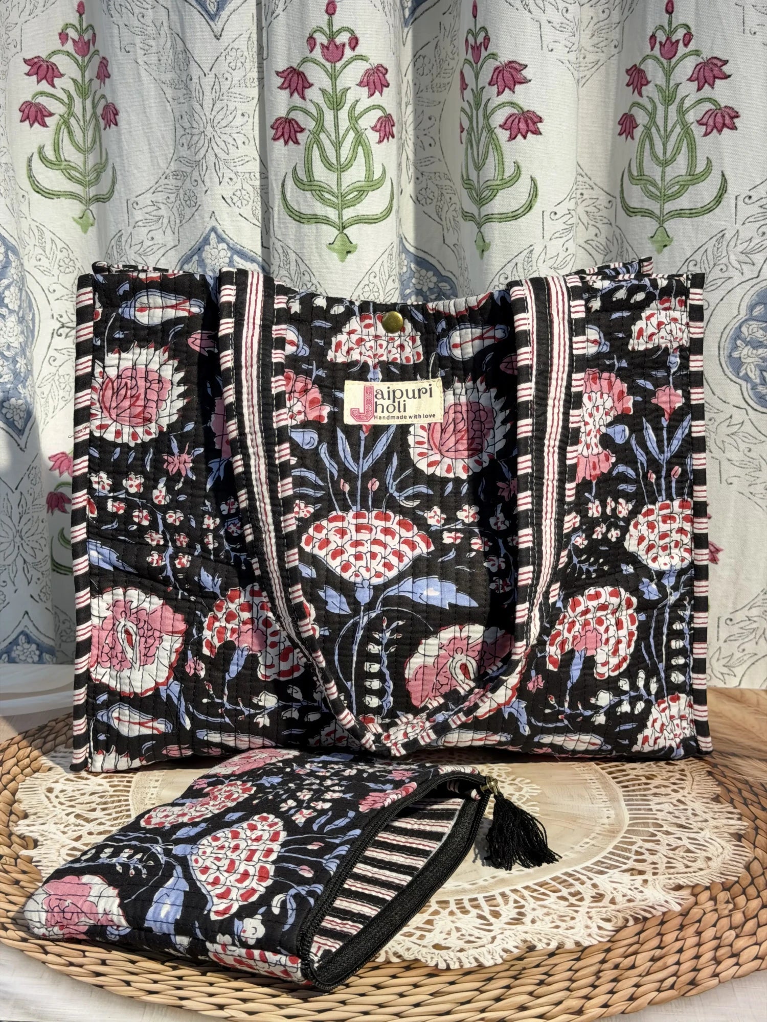 Jaipur block print cotton quilted medium reversible tote bag with matching flat pouch, black and pink floral print, 15 × 12 × 6 inch tote and 9 × 7 inch flat pouch for work, shopping and travel back view