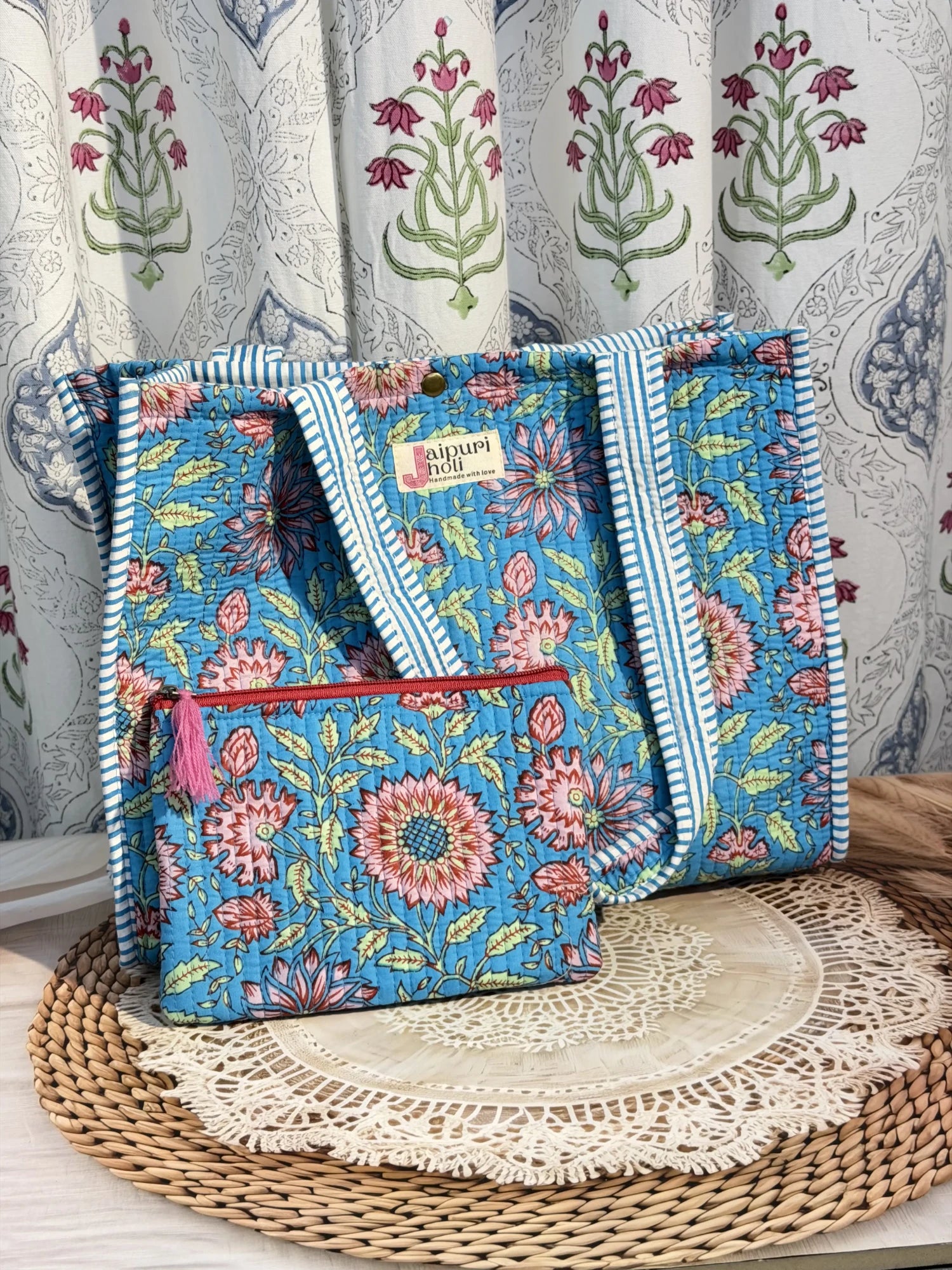 Jaipur block print cotton quilted medium reversible tote bag with matching flat pouch, blue floral print, 15 × 12 × 6 inch tote and 9 × 7 inch flat pouch for office, travel and everyday use front view