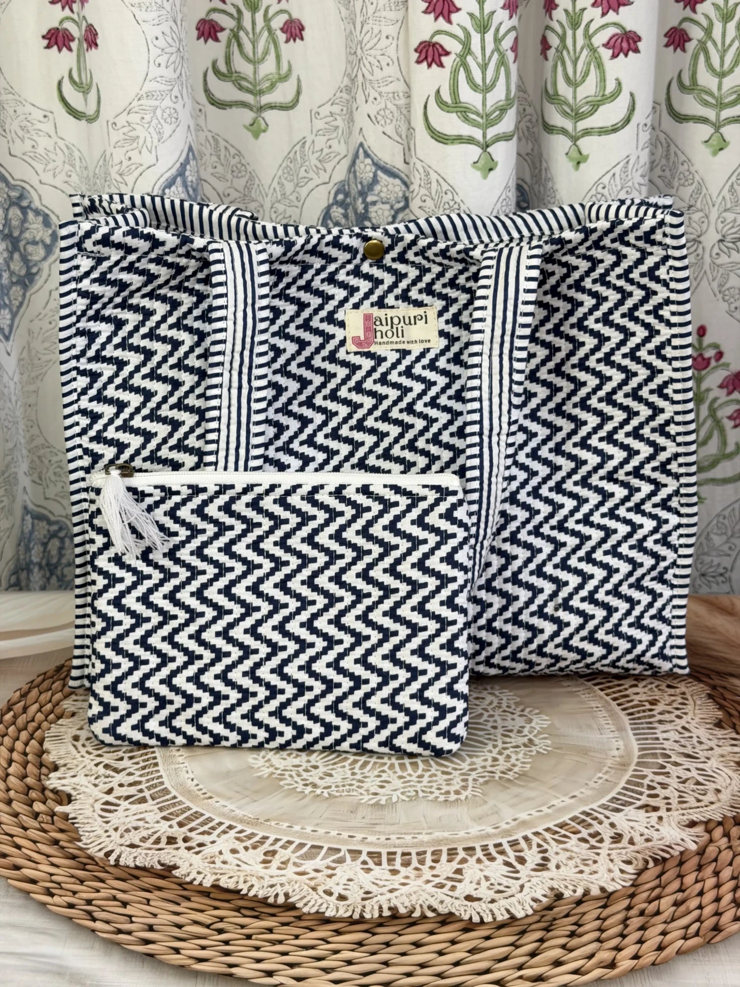 Jaipur block print cotton quilted medium reversible tote bag with matching flat pouch, blue and white geometric zigzag print, 15 × 12 × 6 inch tote and 9 × 7 inch flat pouch for travel, office and everyday use front view