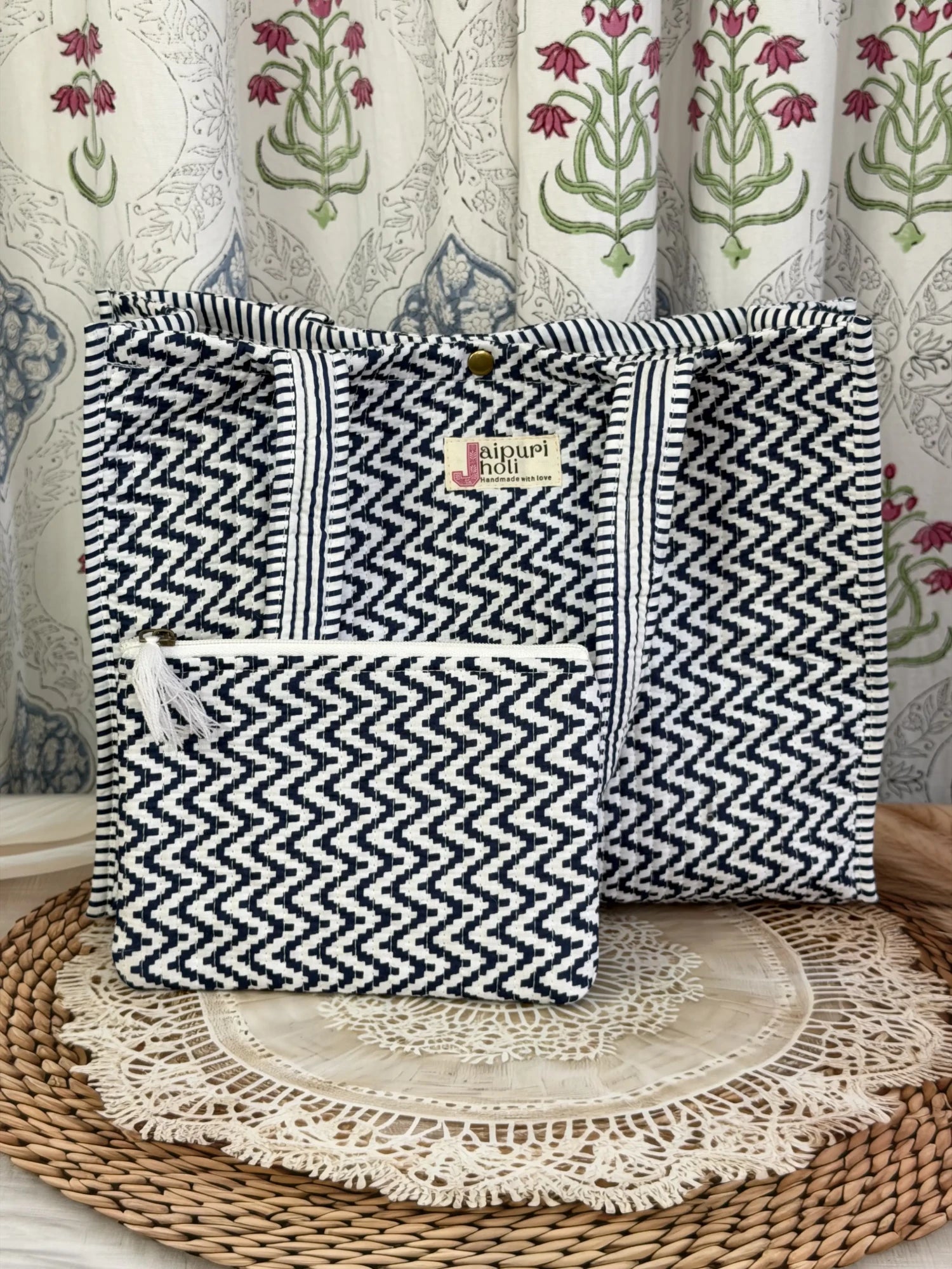 Jaipur block print cotton quilted medium reversible tote bag with matching flat pouch, blue and white geometric zigzag print, 15 × 12 × 6 inch tote and 9 × 7 inch flat pouch for travel, office and everyday use side view
