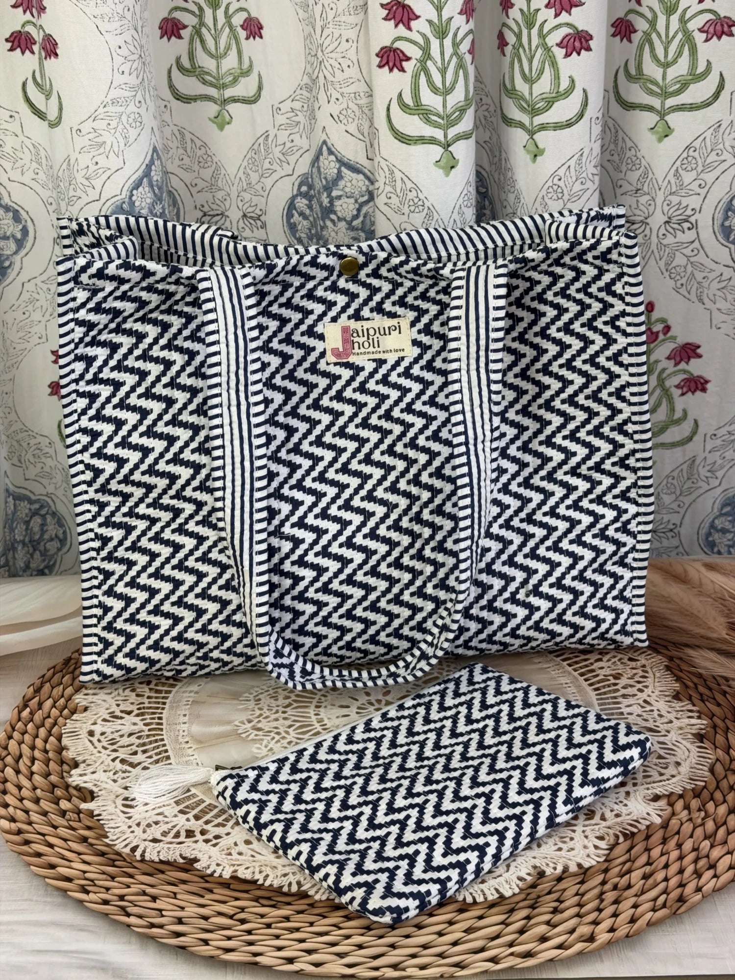 Jaipur block print cotton quilted medium reversible tote bag with matching flat pouch, blue and white geometric zigzag print, 15 × 12 × 6 inch tote and 9 × 7 inch flat pouch for travel, office and everyday use back view