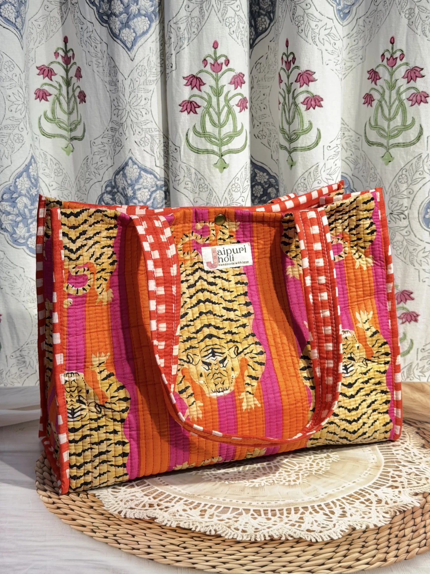 Jaipur block print cotton quilted medium reversible tote bag with matching flat pouch, orange and pink tiger animal print, 15 × 12 × 6 inch tote and 9 × 7 inch flat pouch for office, travel and daily use back view