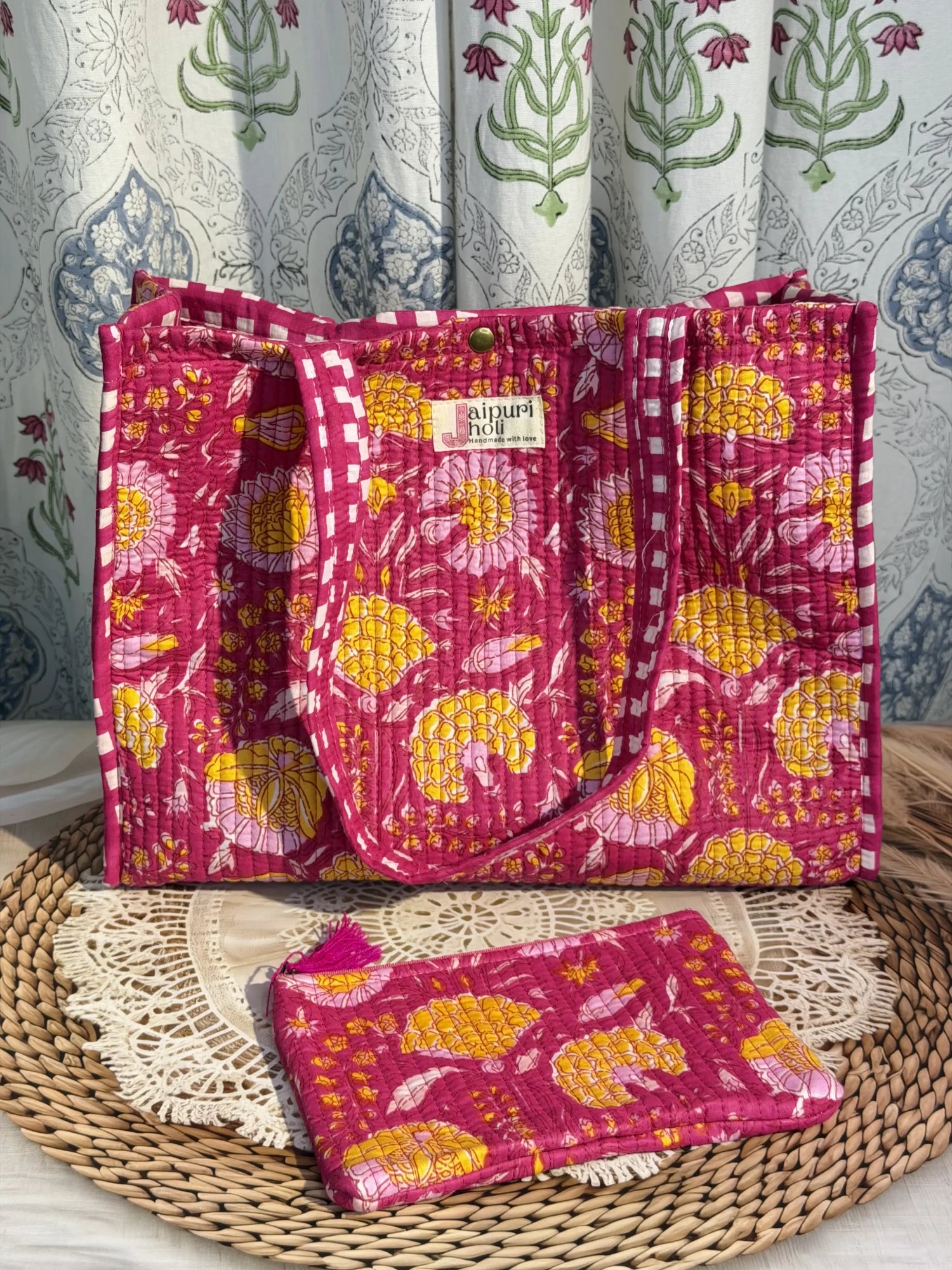 Jaipur block print cotton quilted medium reversible tote bag with matching flat pouch, pink floral print, 15 × 12 × 6 inch tote and 9 × 7 inch flat pouch for office, travel and daily use front view