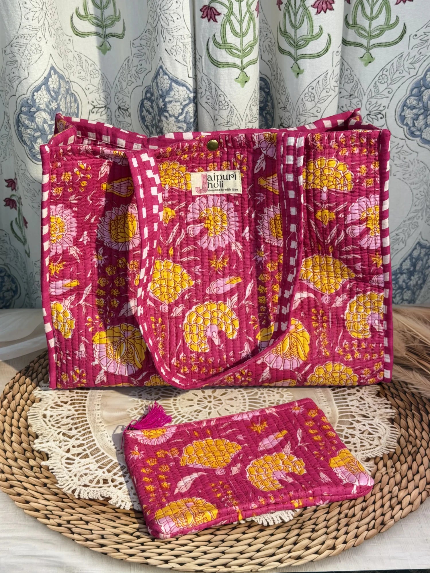 Jaipur block print cotton quilted medium reversible tote bag with matching flat pouch, pink floral print, 15 × 12 × 6 inch tote and 9 × 7 inch flat pouch for office, travel and daily use side view