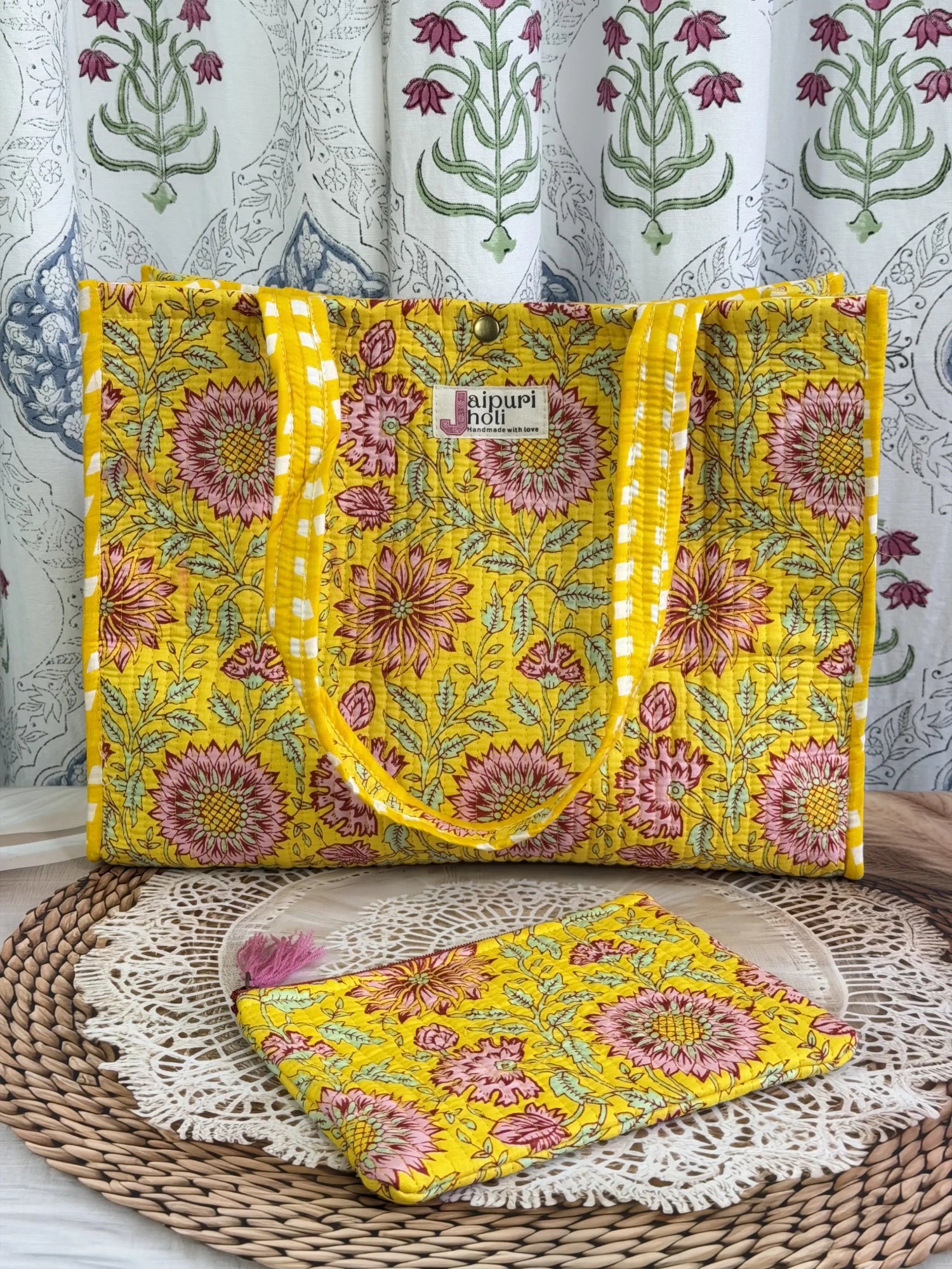 Jaipur block print cotton quilted medium reversible tote bag with matching flat pouch, yellow floral print, 15 × 12 × 6 inch tote and 9 × 7 inch flat pouch for daily use, travel and shopping front view