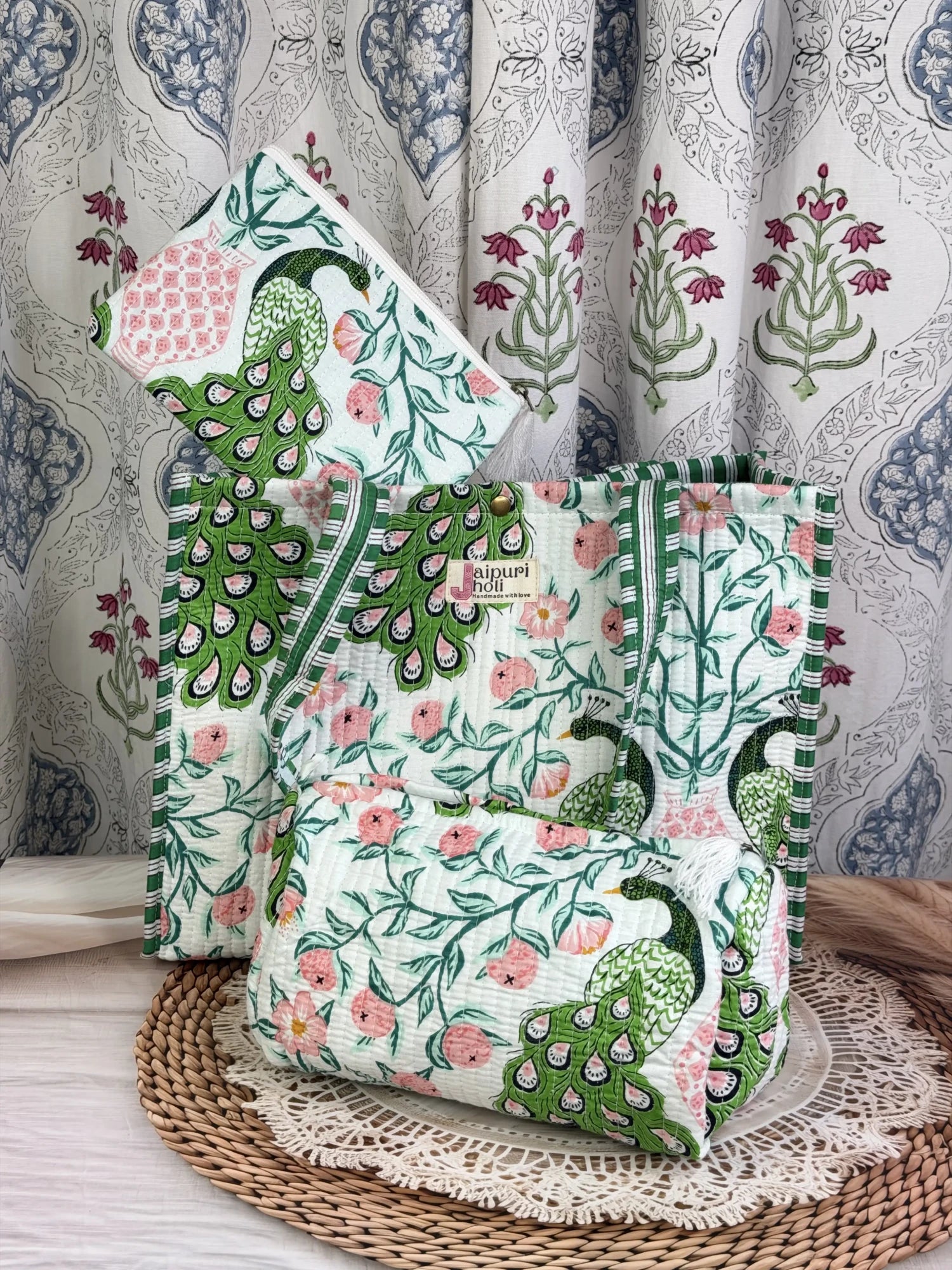 Jaipur block print medium cotton quilted reversible tote bag with matching toiletry pouch and flat pouch, green and pink peacock print, 15 × 12 × 6 inch tote with button closure, 10 × 6 inch toiletry pouch and 9 × 7 inch flat pouch interior view