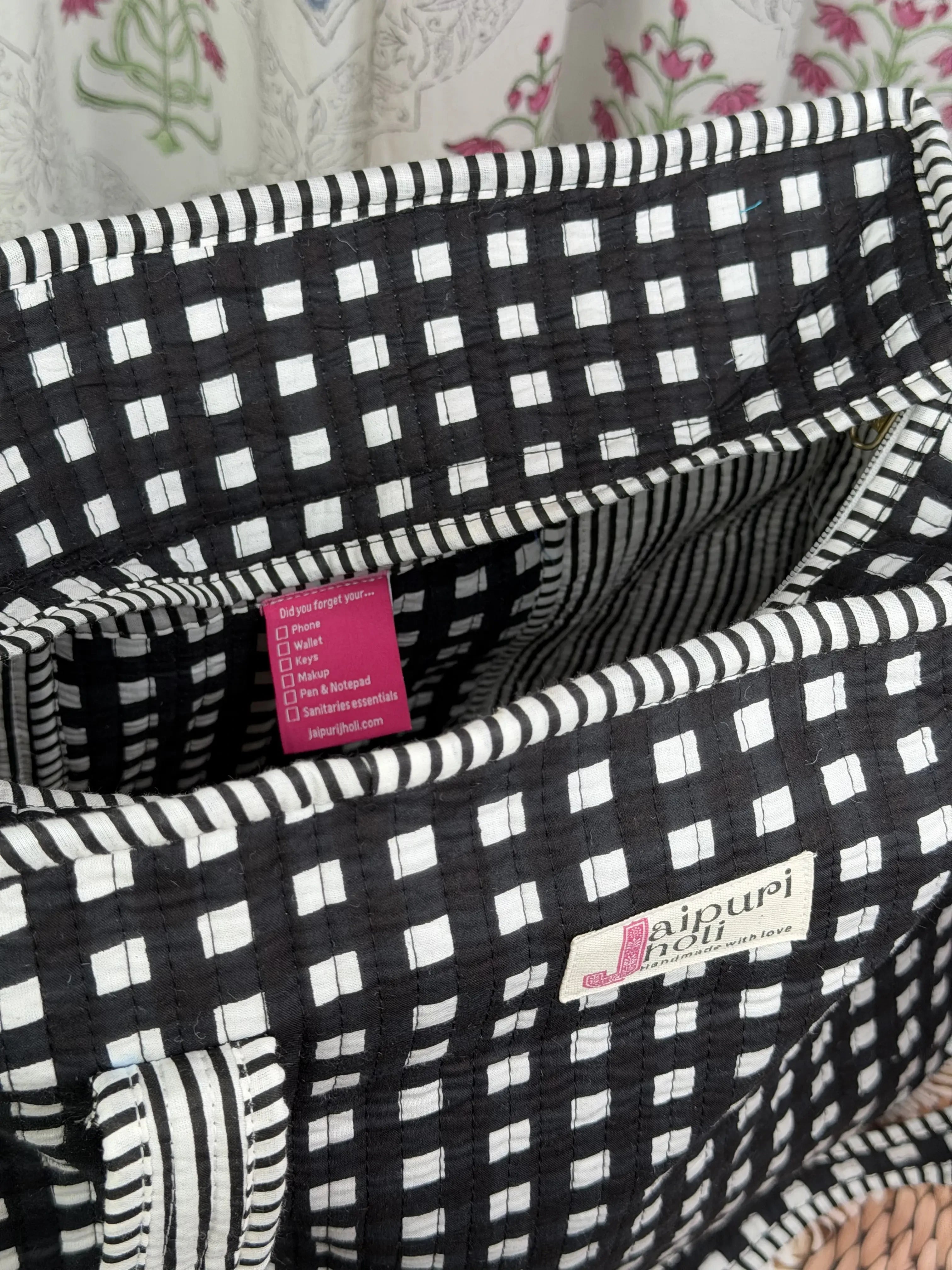 Jaipur block print cotton quilted medium zip tote bag with matching flat pouch, black and white geometric check print, 15 × 12 × 6 inch tote with 9 × 7 inch flat pouch for office, travel and daily use close-up view