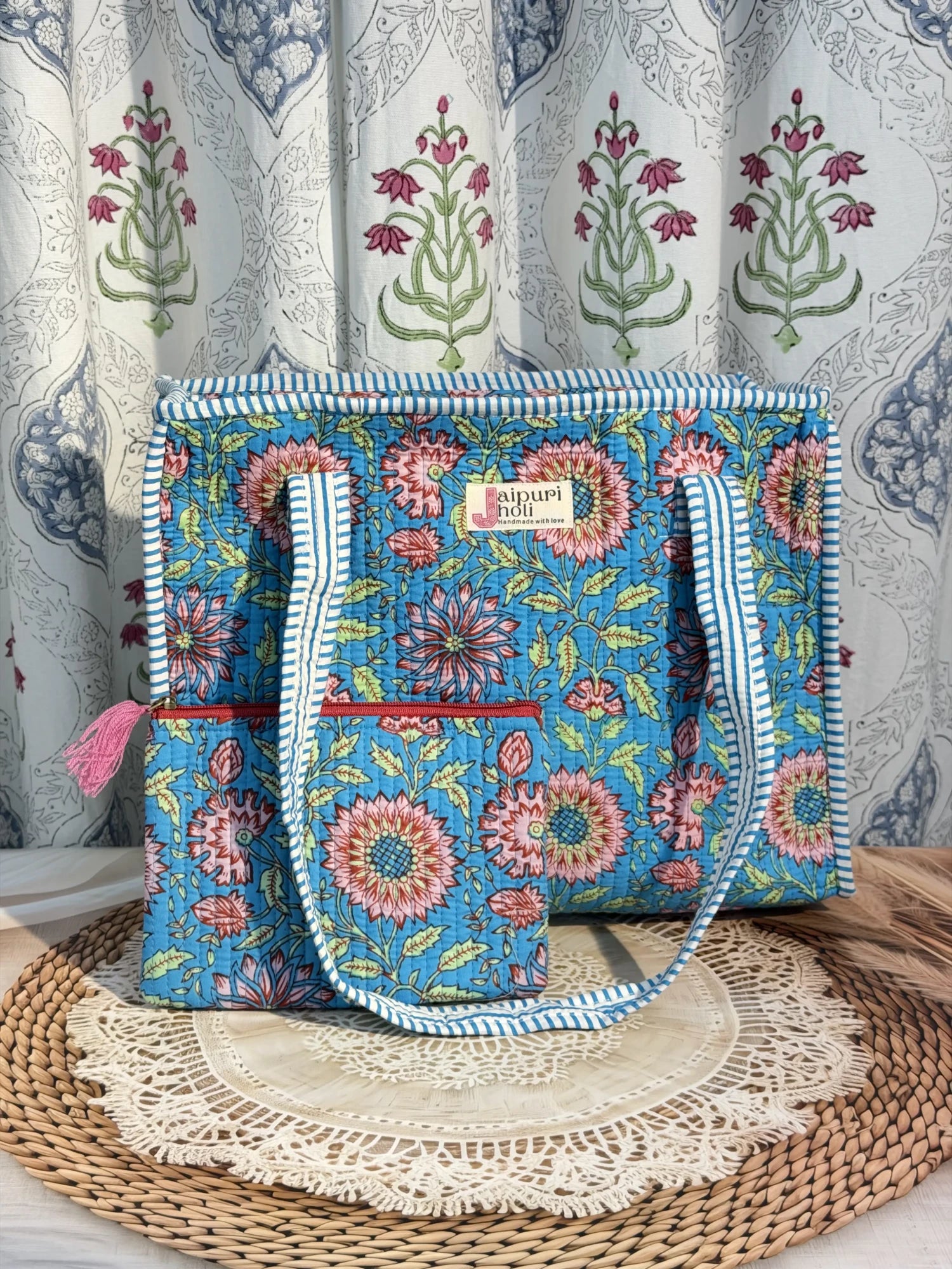 Jaipur block print cotton quilted medium zip tote bag with matching flat pouch, blue floral print, 15 × 12 × 6 inch tote with 9 × 7 inch flat pouch for office, shopping and travel front view