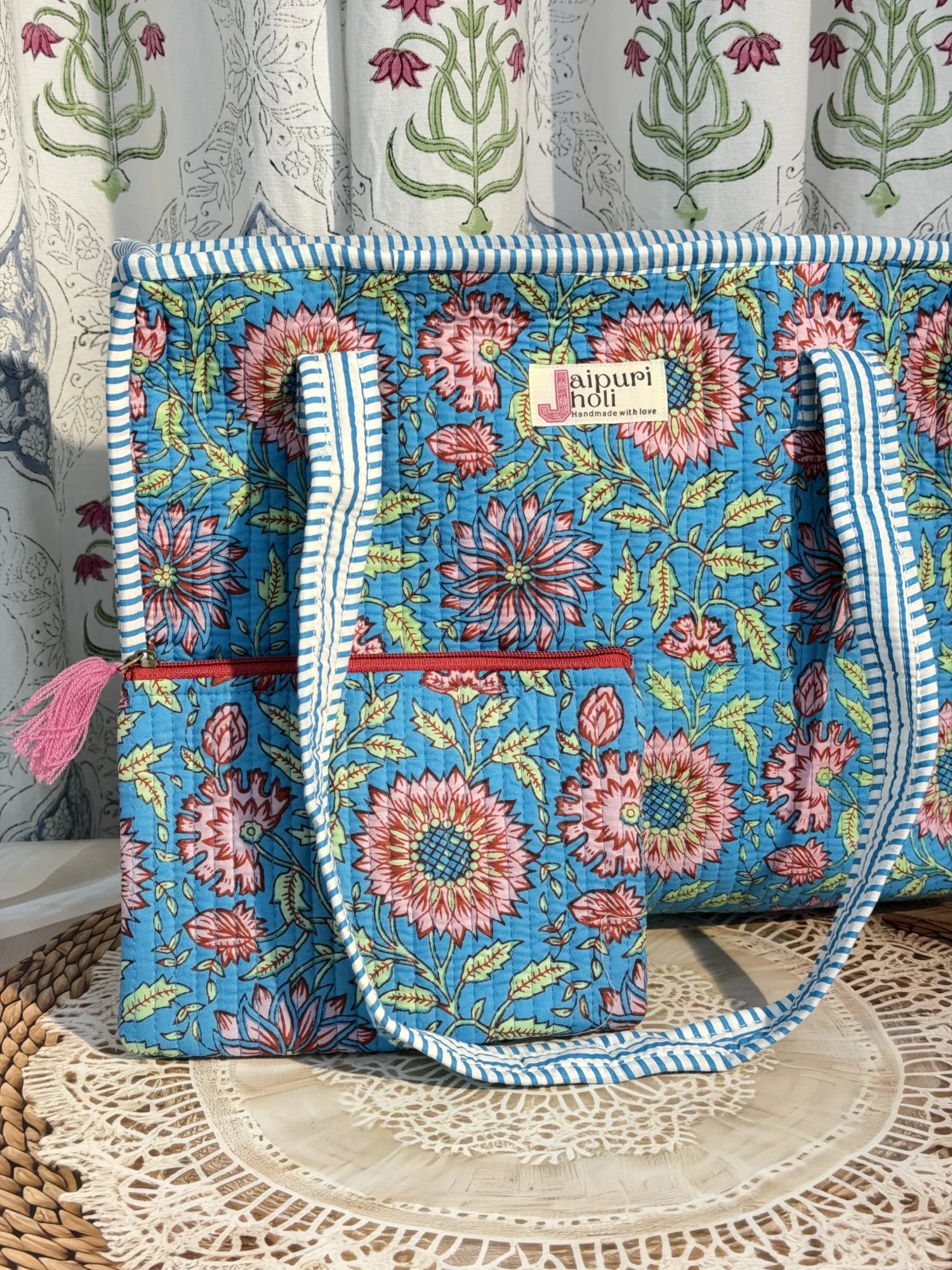 Jaipur block print cotton quilted medium zip tote bag with matching flat pouch, blue floral print, 15 × 12 × 6 inch tote with 9 × 7 inch flat pouch for office, shopping and travel side view