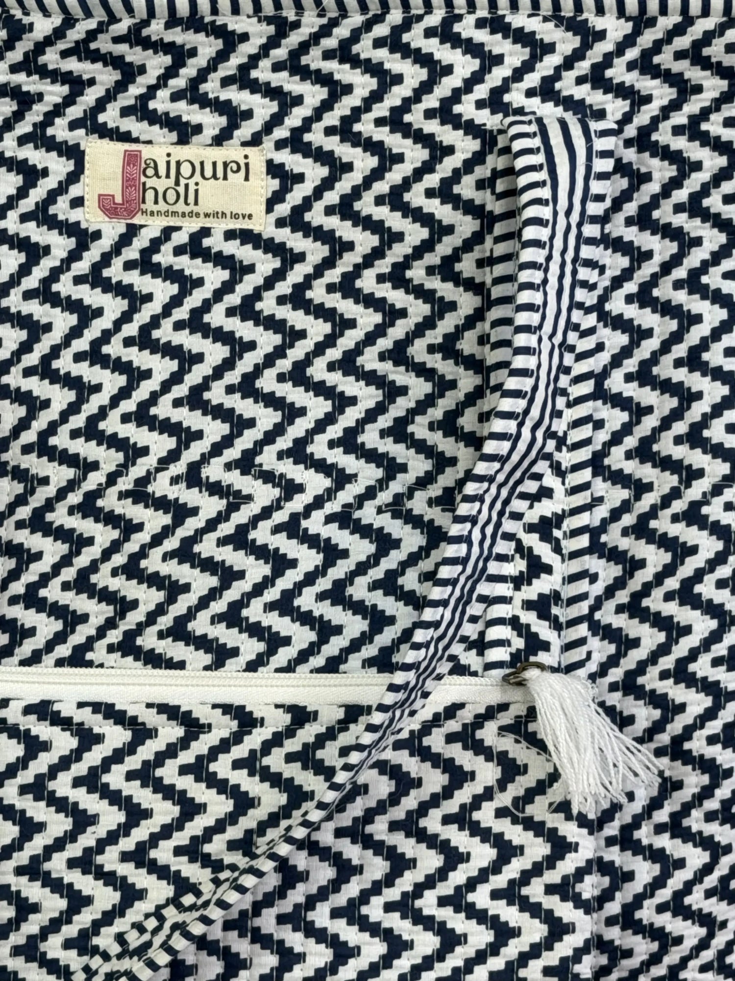 Jaipur block print cotton quilted medium zip tote bag with matching flat pouch, blue and white geometric zigzag print, 15 × 12 × 6 inch tote with 9 × 7 inch flat pouch for office, travel and daily use interior view