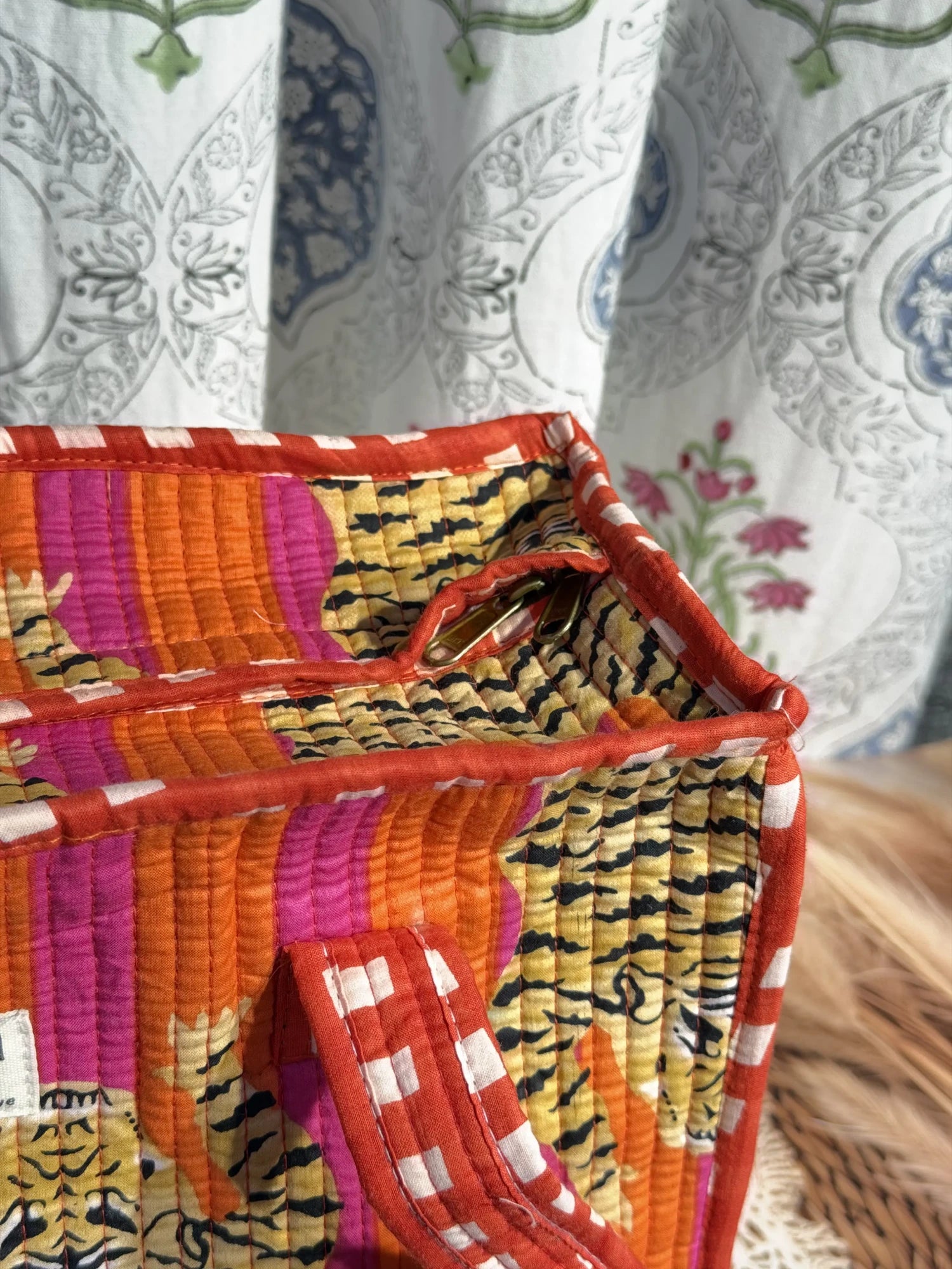 Jaipur block print cotton quilted medium zip tote bag with matching flat pouch, orange and pink tiger animal print, 15 × 12 × 6 inch tote with 9 × 7 inch flat pouch for office, travel and shopping back view