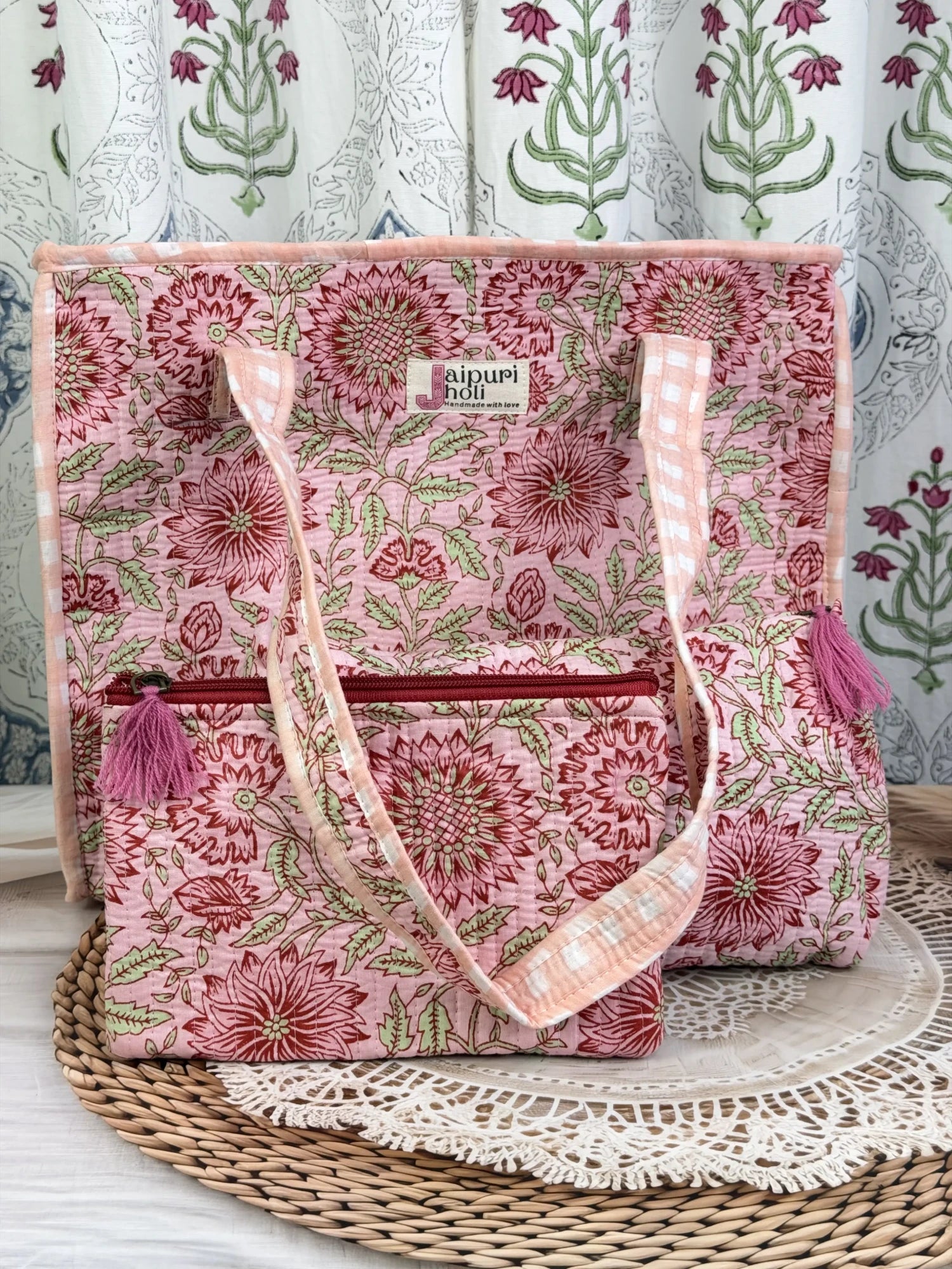 Jaipur block print cotton quilted medium zip tote bag with matching flat pouch, peach and pink floral print, 15 × 12 × 6 inch tote with 9 × 7 inch flat pouch for work, travel and daily use front view