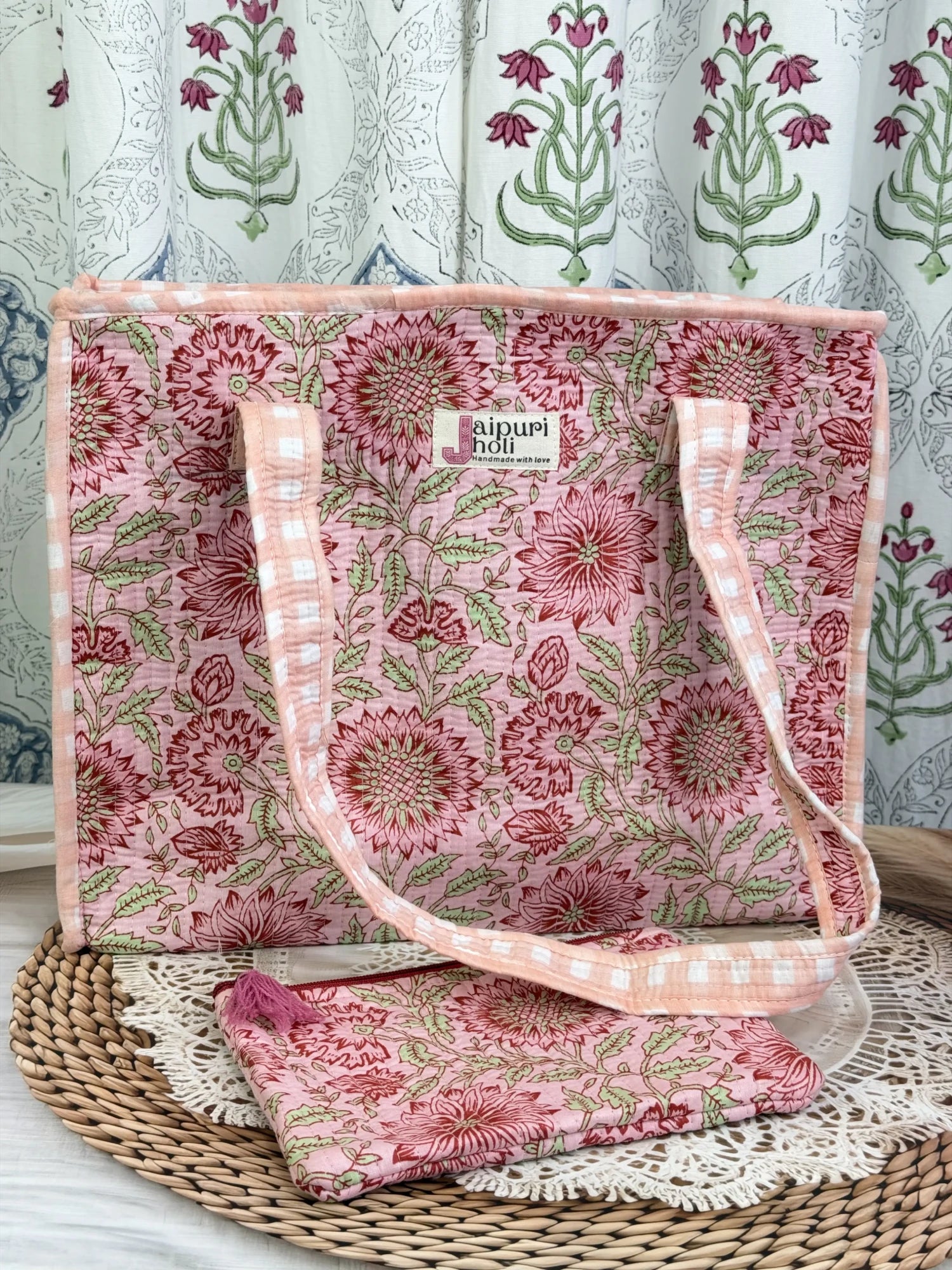 Jaipur block print cotton quilted medium zip tote bag with matching flat pouch, peach and pink floral print, 15 × 12 × 6 inch tote with 9 × 7 inch flat pouch for work, travel and daily use back view