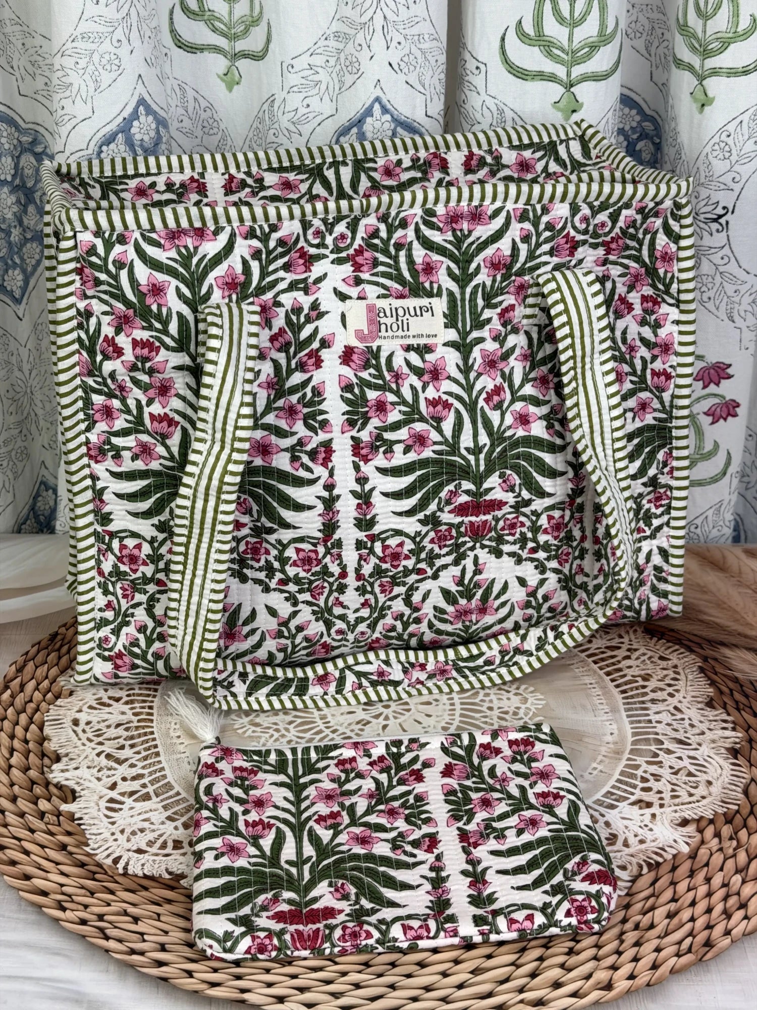 Jaipur block print cotton quilted medium zip tote bag with matching flat pouch, pink floral and green leaf print, 15 × 12 × 6 inch tote with 9 × 7 inch flat pouch for travel, office and daily use front view