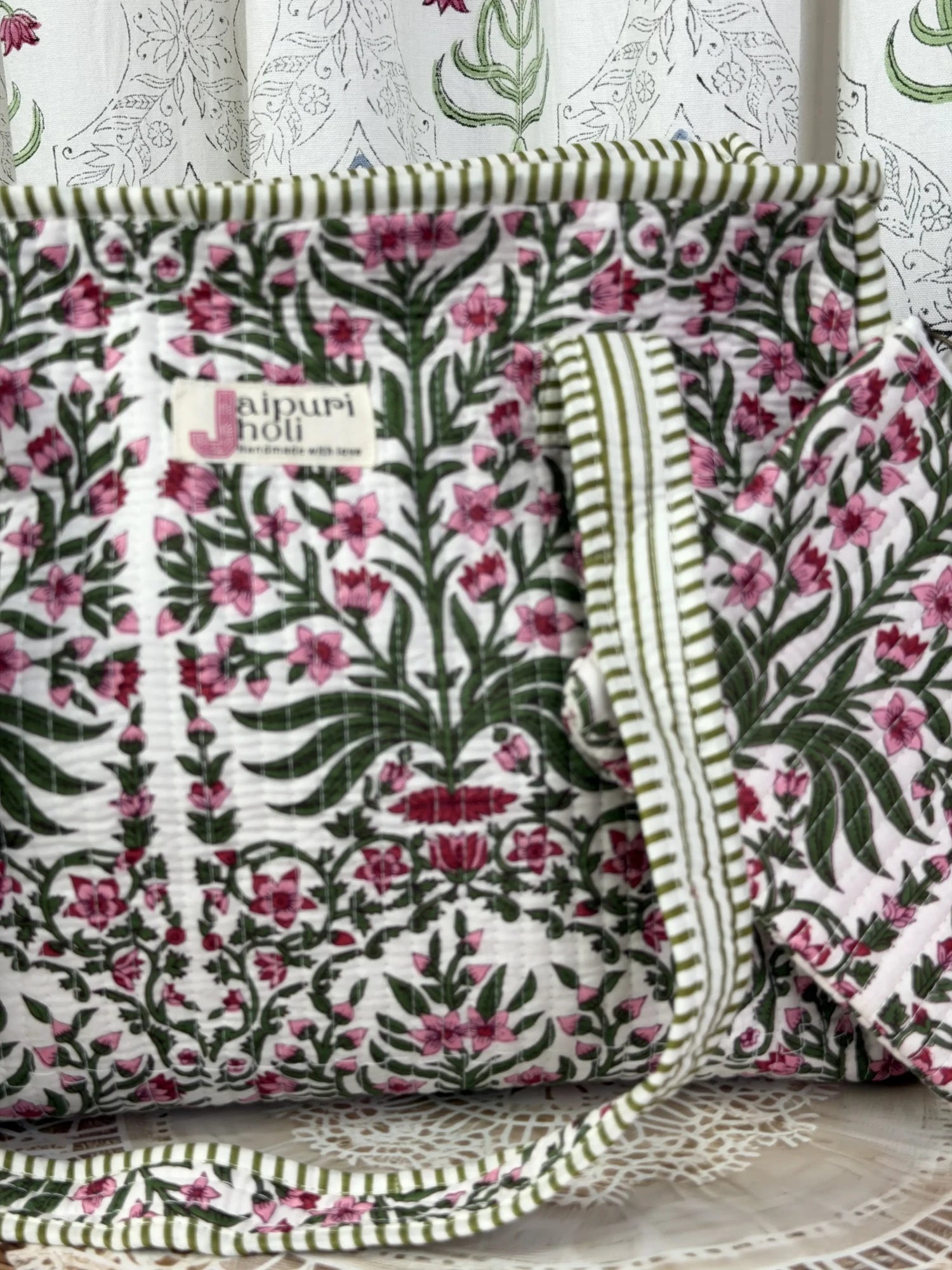 Jaipur block print cotton quilted medium zip tote bag with matching flat pouch, pink floral and green leaf print, 15 × 12 × 6 inch tote with 9 × 7 inch flat pouch for travel, office and daily use interior view