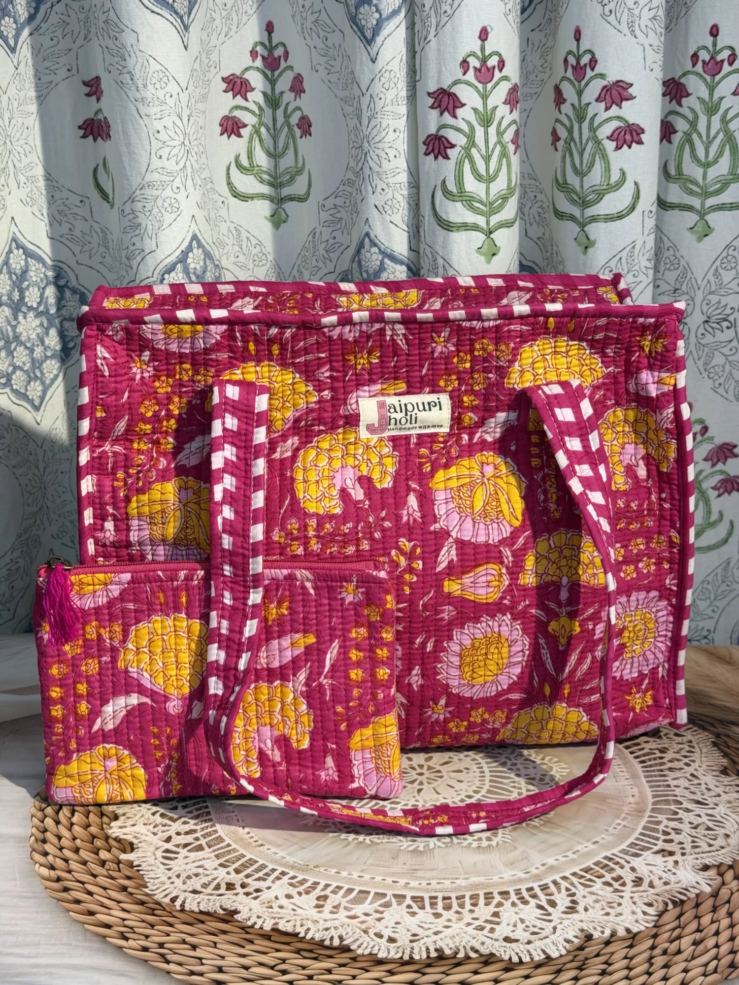 Jaipur block print cotton quilted medium zip tote bag with matching flat pouch, pink floral print, 15 × 12 × 6 inch tote with 9 × 7 inch flat pouch for office, shopping and everyday use front view