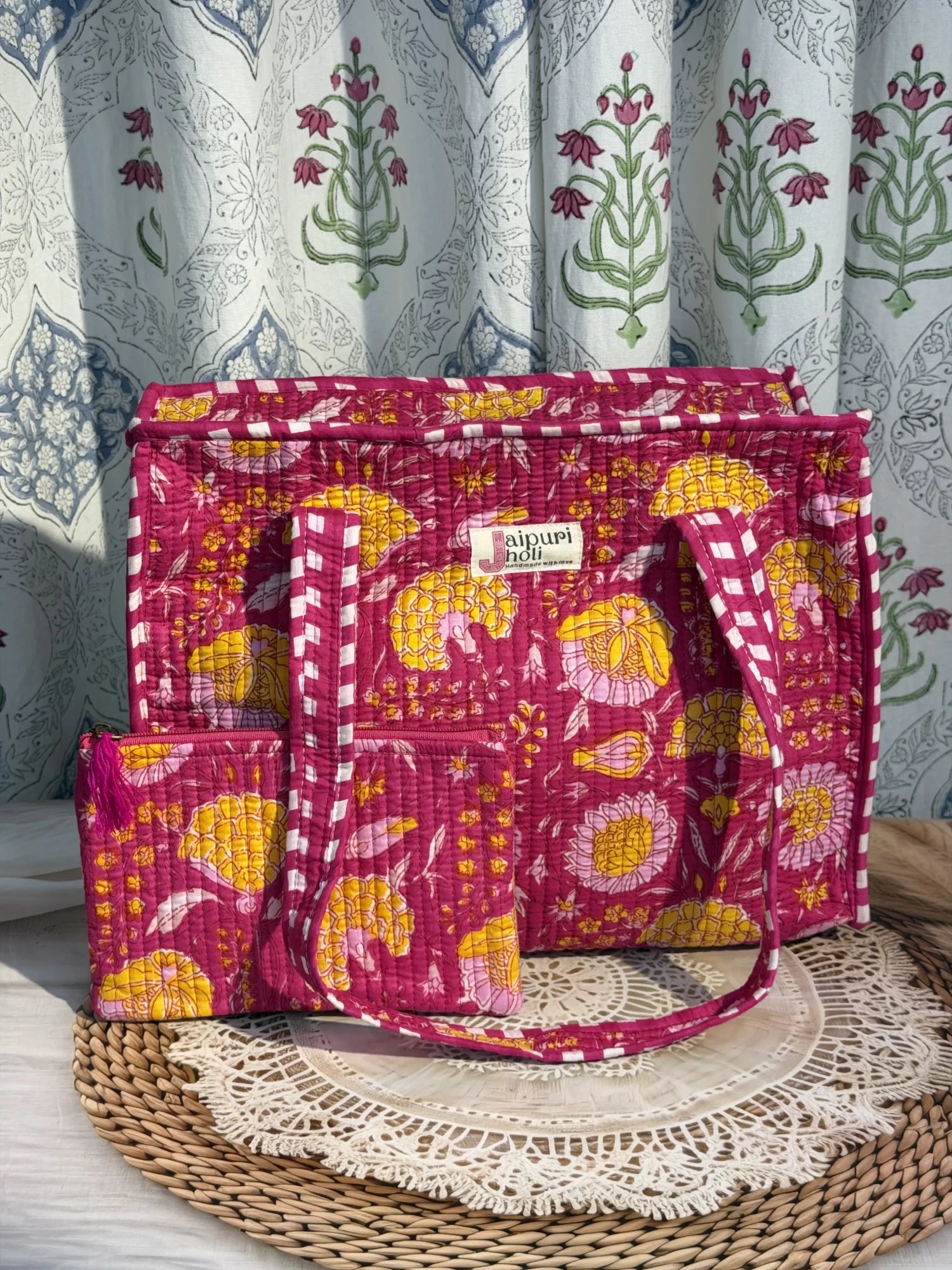 Jaipur block print cotton quilted medium zip tote bag with matching flat pouch, pink floral print, 15 × 12 × 6 inch tote with 9 × 7 inch flat pouch for office, shopping and everyday use side view
