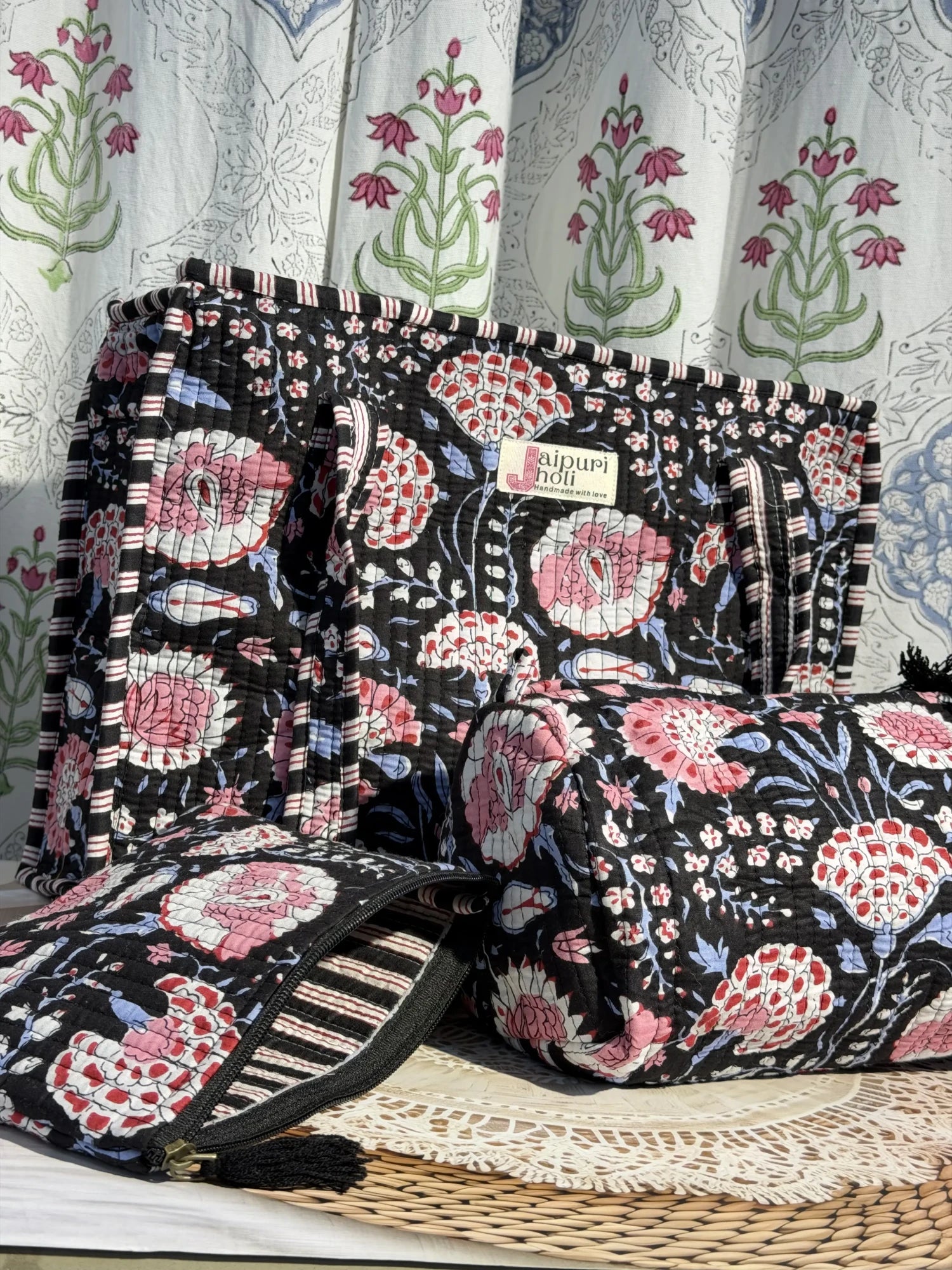 Jaipur block print medium cotton quilted zip tote bag with matching toiletry pouch and flat pouch, black and pink floral print, 15 × 12 × 6 inch tote, 10 × 6 inch toiletry pouch and 9 × 7 inch flat pouch interior view