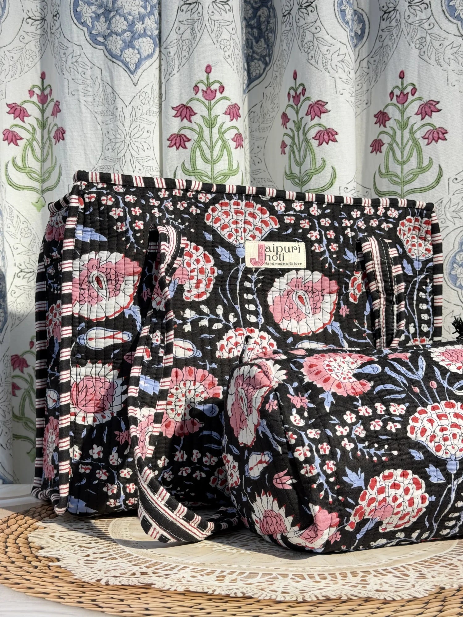 Jaipur block print cotton quilted zip tote bag with matching pouch, black and pink floral print, 15x12x6 inch tote with 10x6 inch pouch for storing cosmetics, toiletries and daily essentials back view