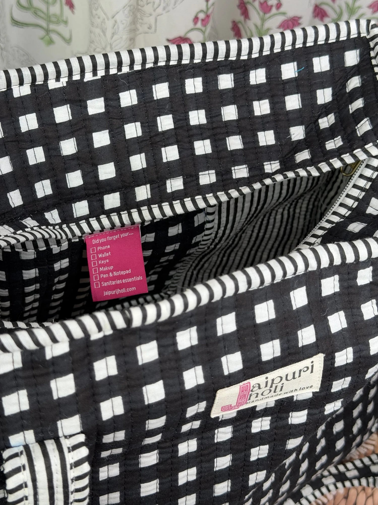 Jaipur block print cotton quilted zip tote bag with matching pouch, black and white geometric check print, 15x12x6 inch tote with 10x6 inch pouch for organizing toiletries, cosmetics and medicines.Interior View