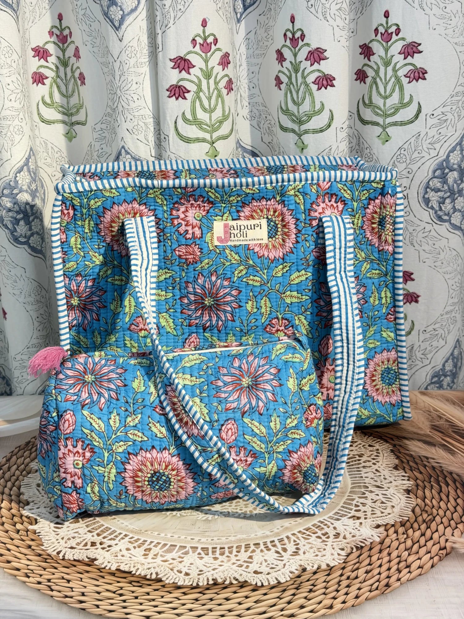 Jaipur block print cotton quilted zip tote bag with matching pouch, blue floral print, 15x12x6 inch tote with 10x6 inch pouch for organizing toiletries, cosmetics and travel items.Front View