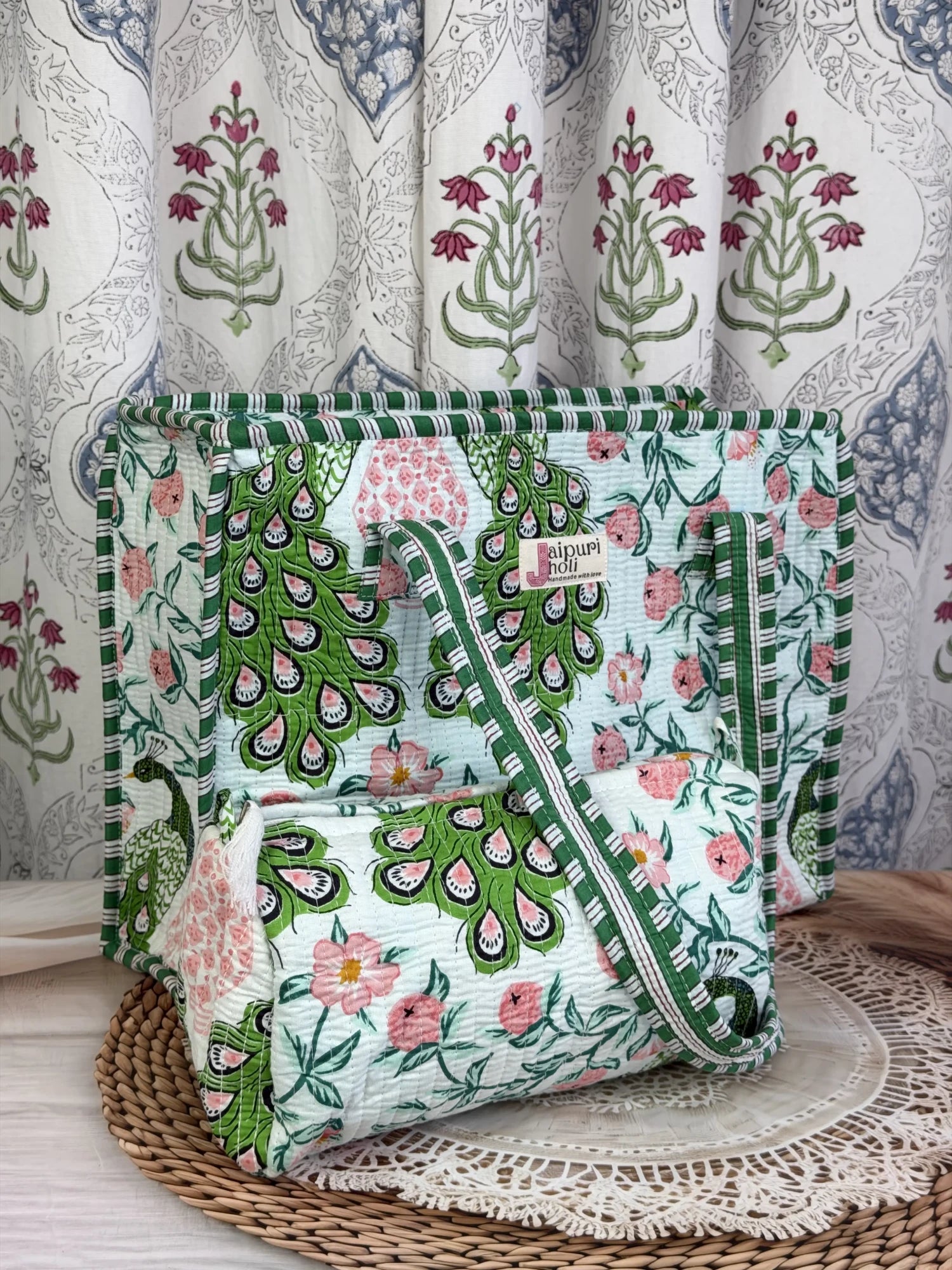 Jaipur block print cotton quilted zip tote bag with matching pouch, green and pink peacock print, 15x12x6 inch tote with 10x6 inch pouch for organizing toiletries and everyday essentials front view