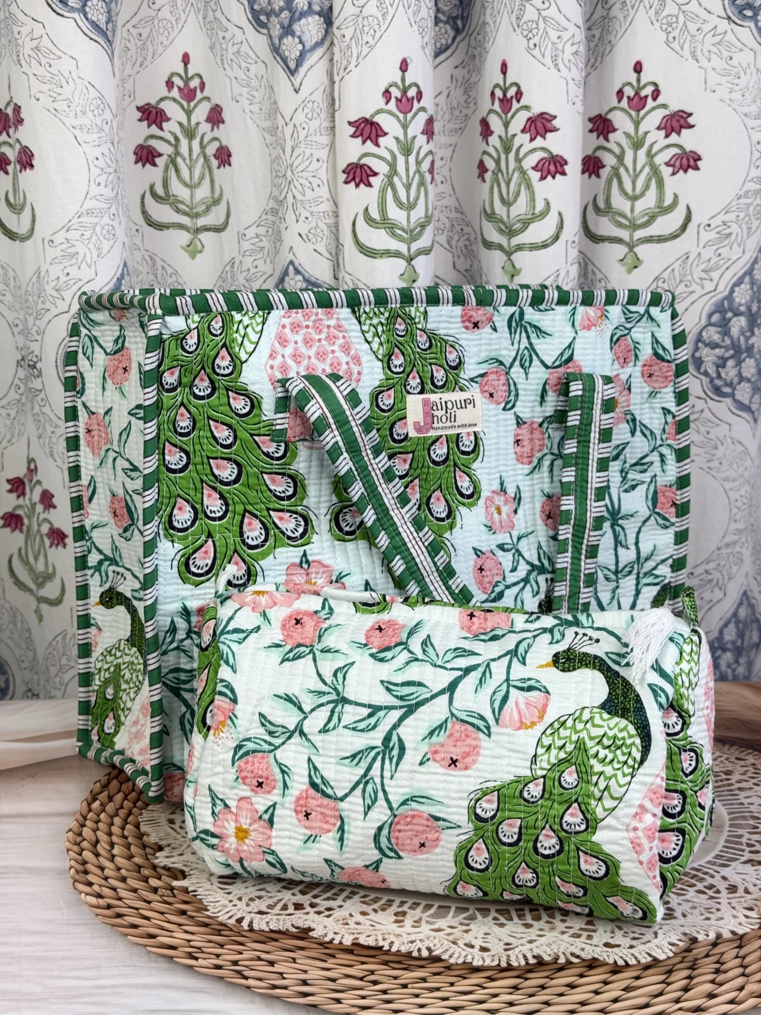 Jaipur block print cotton quilted zip tote bag with matching pouch, green and pink peacock print, 15x12x6 inch tote with 10x6 inch pouch for organizing toiletries and everyday essentials side view