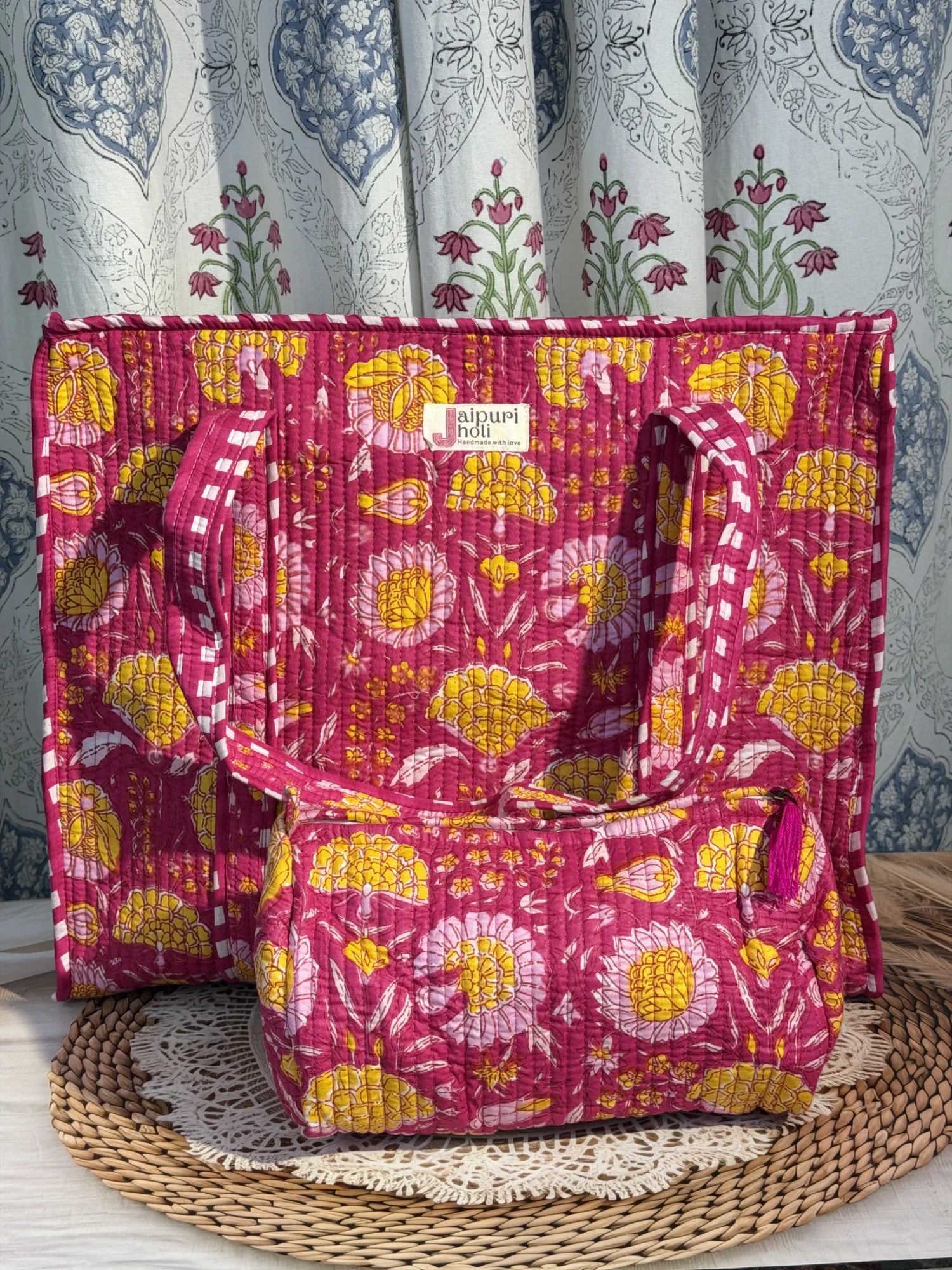 Jaipur block print cotton quilted zip tote bag with matching pouch, pink floral print, 15x12x6 inch tote with 10x6 inch pouch for organizing cosmetics, medicines and toiletries side view