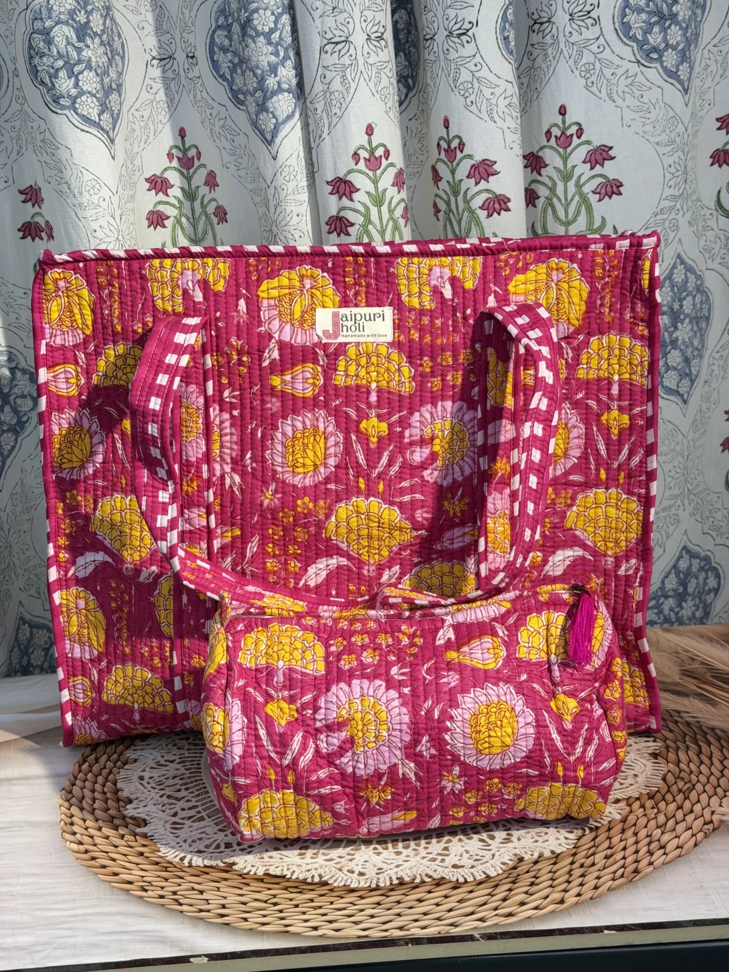 Jaipur block print cotton quilted zip tote bag with matching pouch, pink floral print, 15x12x6 inch tote with 10x6 inch pouch for organizing cosmetics, medicines and toiletries front view