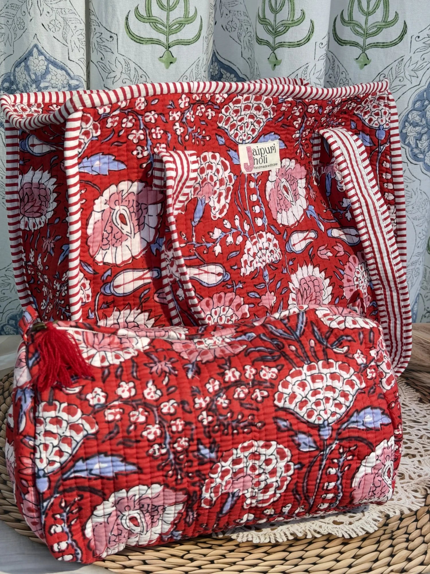Jaipur block print cotton quilted zip tote bag with matching pouch, red floral print, 15x12x6 inch tote with 10x6 inch pouch for organizing cosmetics, medicines and small essentials side view