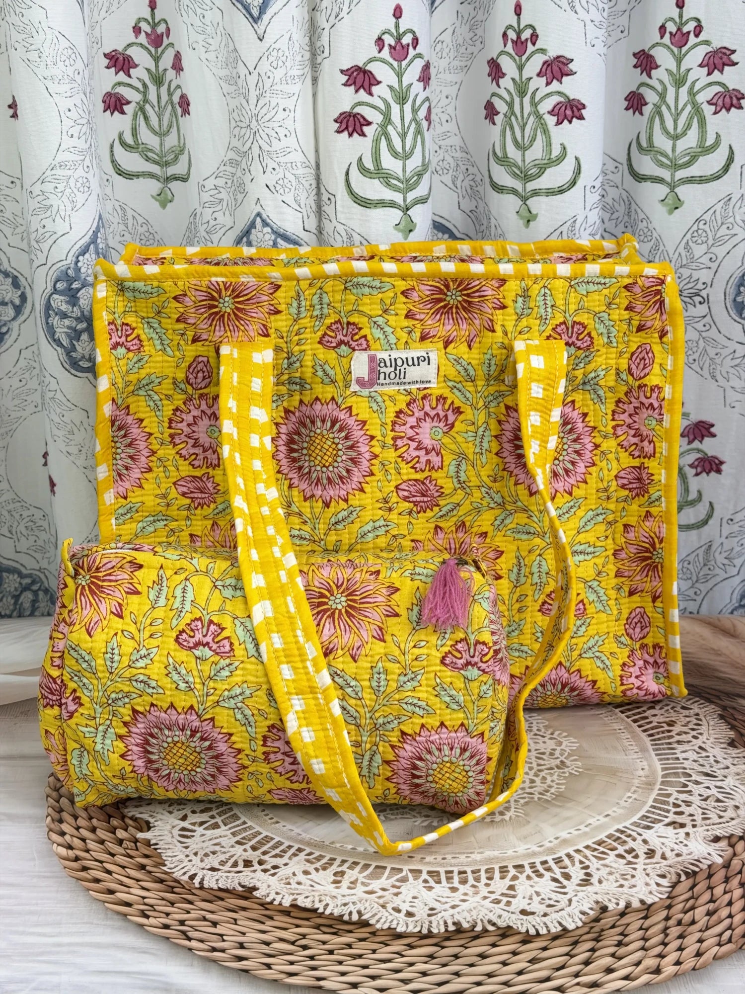 Jaipur block print cotton quilted zip tote bag with matching pouch, yellow floral print, 15x12x6 inch tote with 10x6 inch pouch for keeping toiletries, cosmetics and daily essentials organized front view