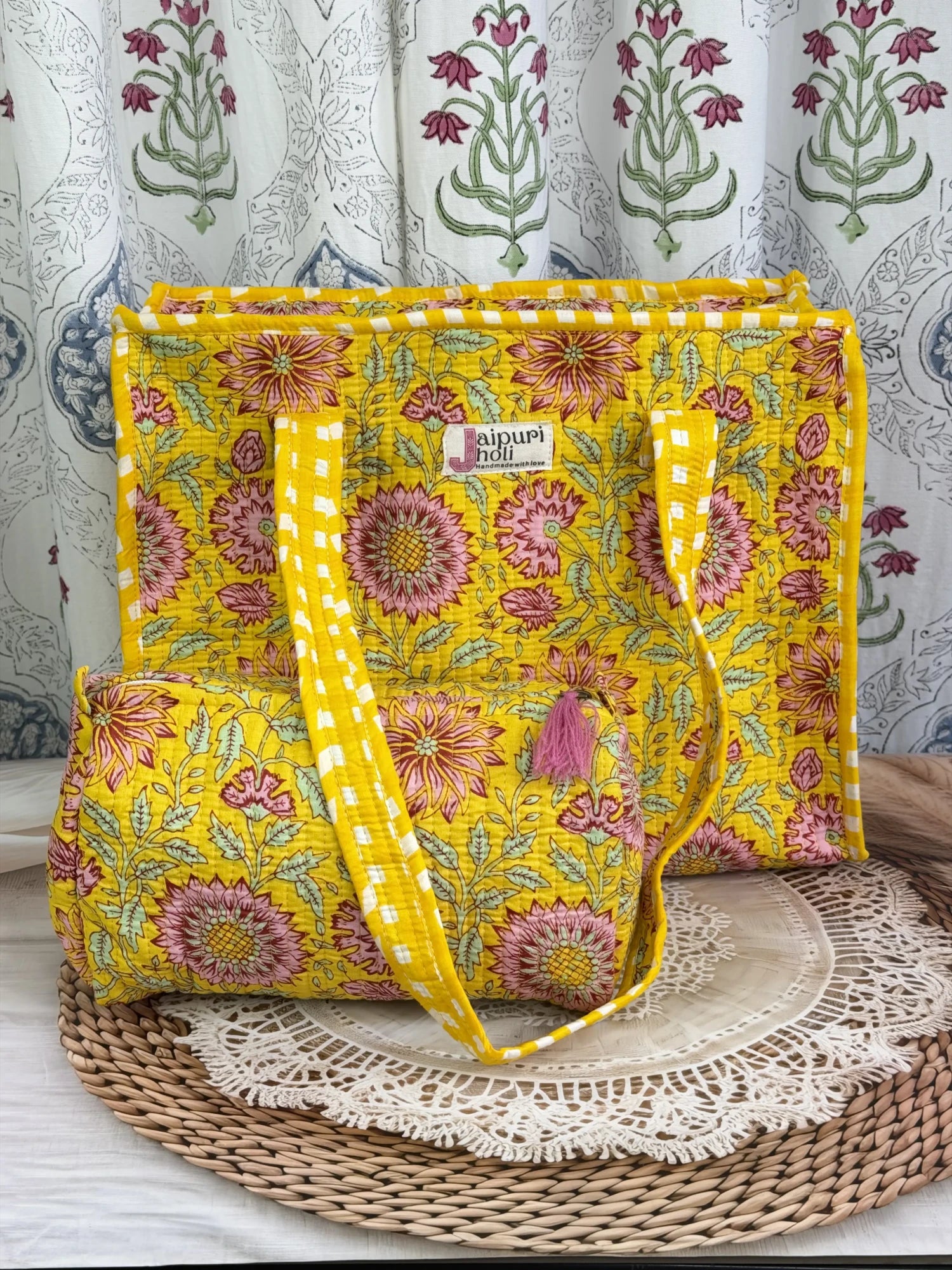 Jaipur block print cotton quilted zip tote bag with matching pouch, yellow floral print, 15x12x6 inch tote with 10x6 inch pouch for keeping toiletries, cosmetics and daily essentials organized side view