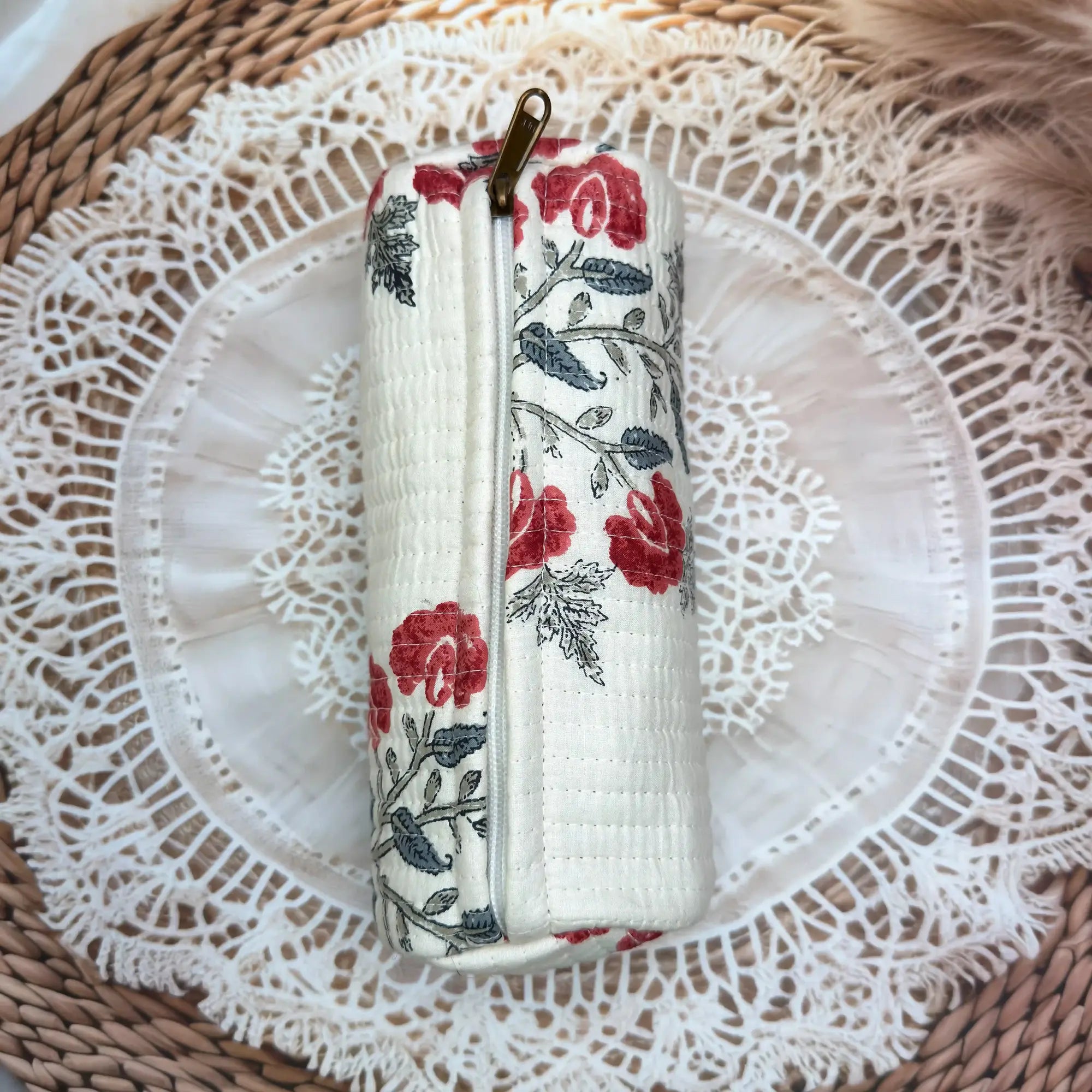 Quilted cotton white pencil pouch with red and floral Jaipuri hand block print, zip closure, handmade pen case for school and office stationery.