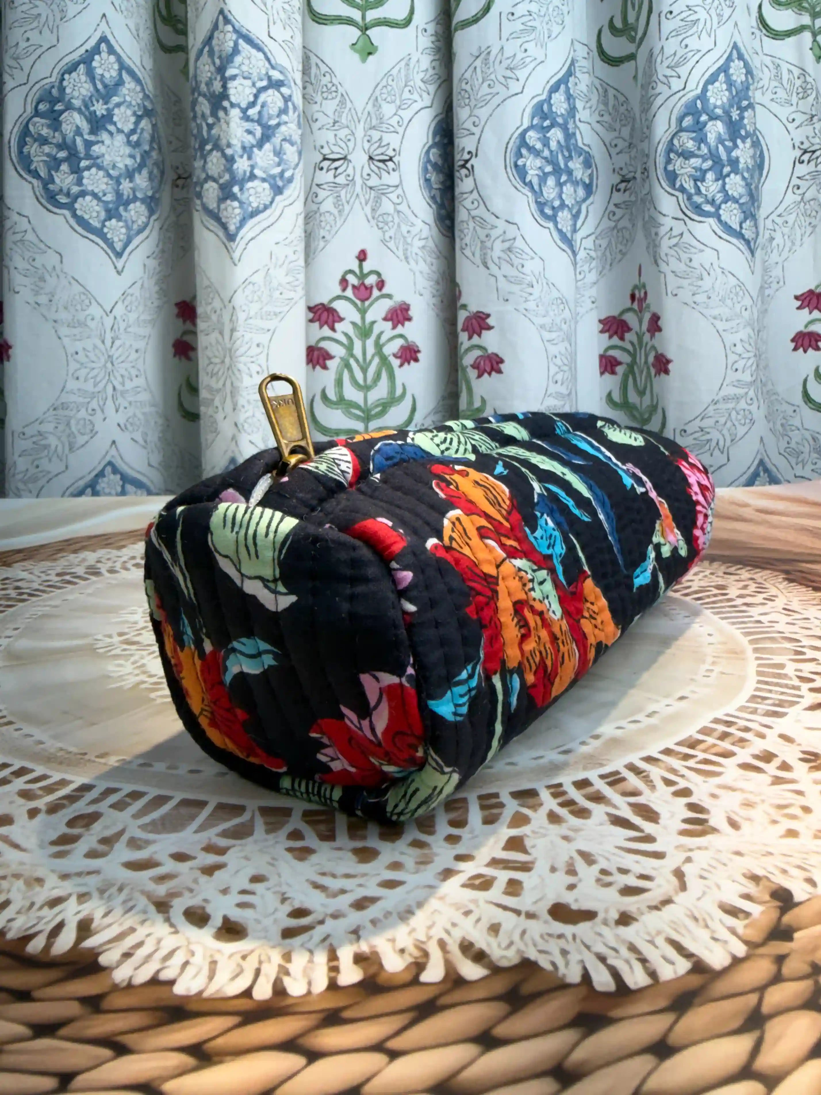 Quilted cotton black pencil pouch with red, orange and navy floral Jaipuri hand  block print, zip closure, handmade pen pouch for school, office and travel.