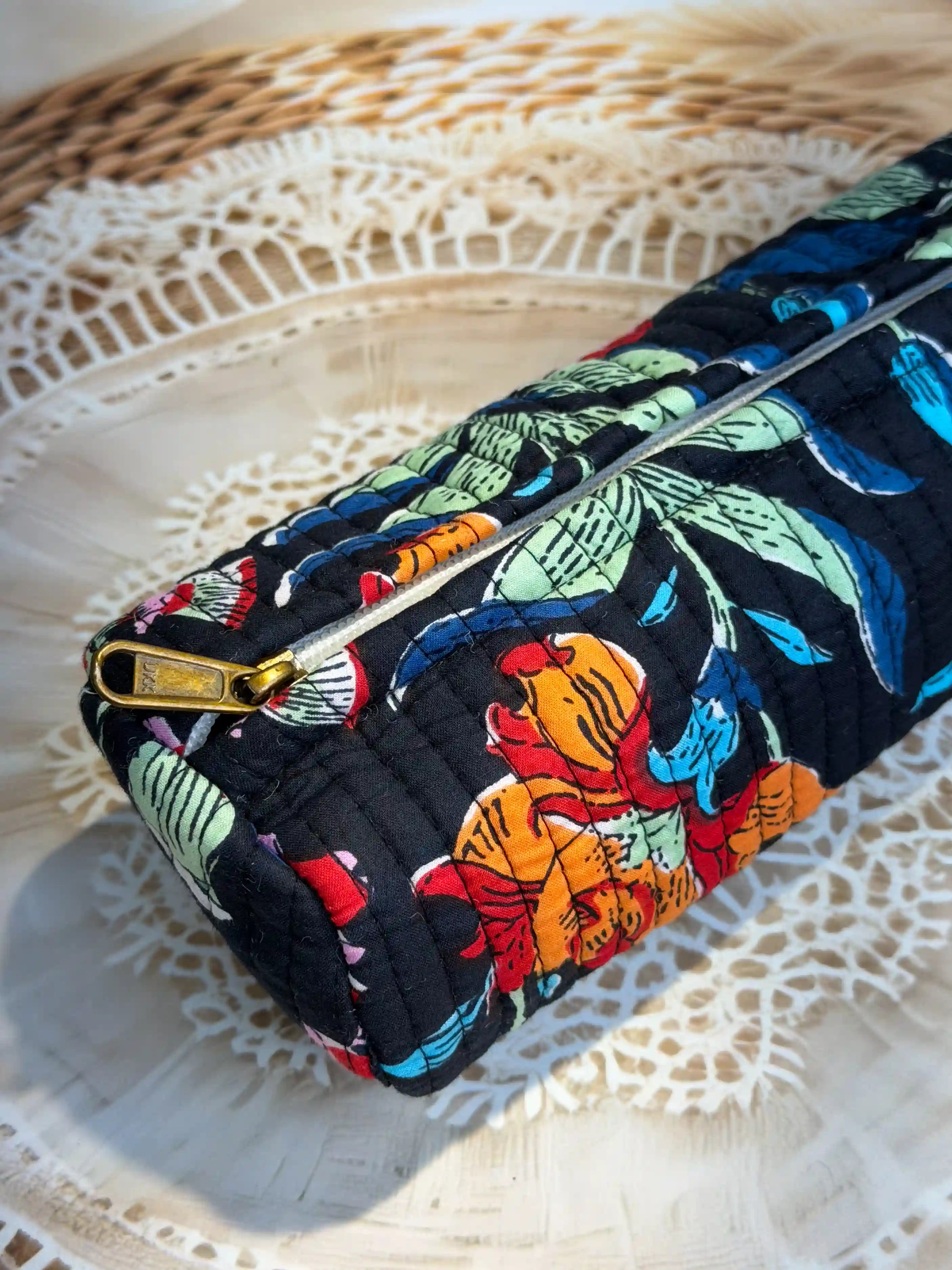 Quilted cotton black pencil pouch with red, orange and navy floral Jaipuri hand  block print, zip closure, handmade pen pouch for school, office and travel.